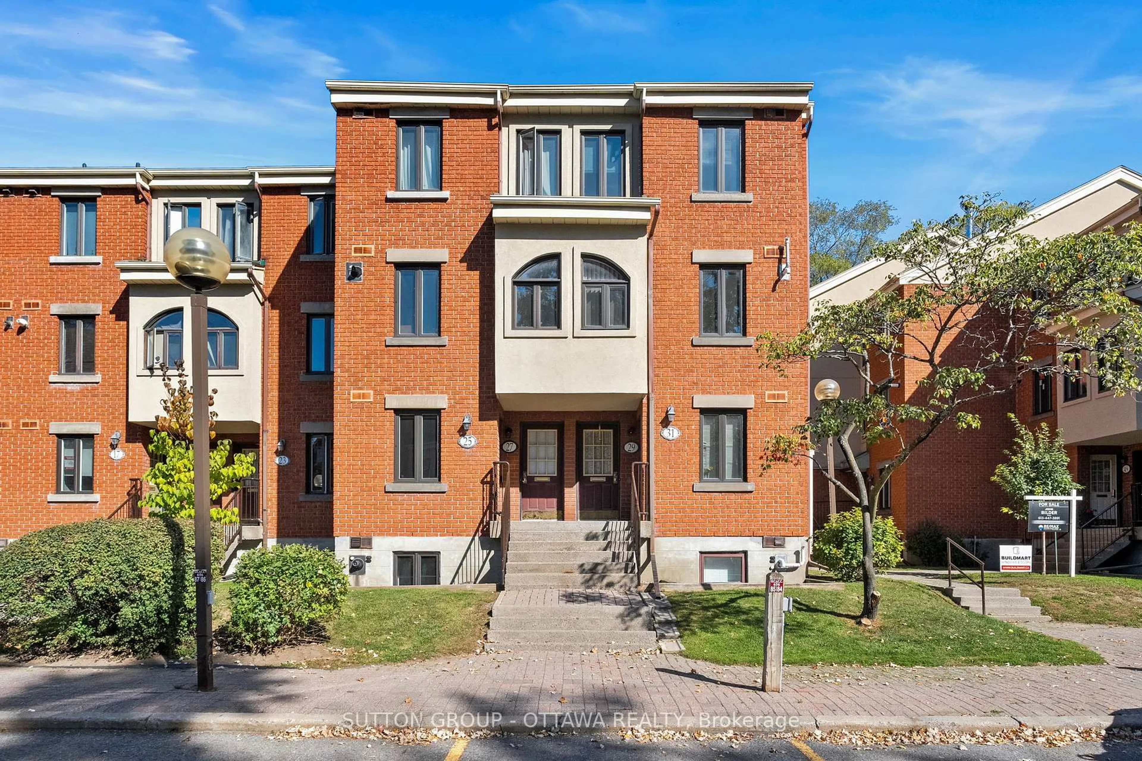 Home with brick exterior material, street for 25 Crispin Private, Ottawa Ontario K1K 2T7