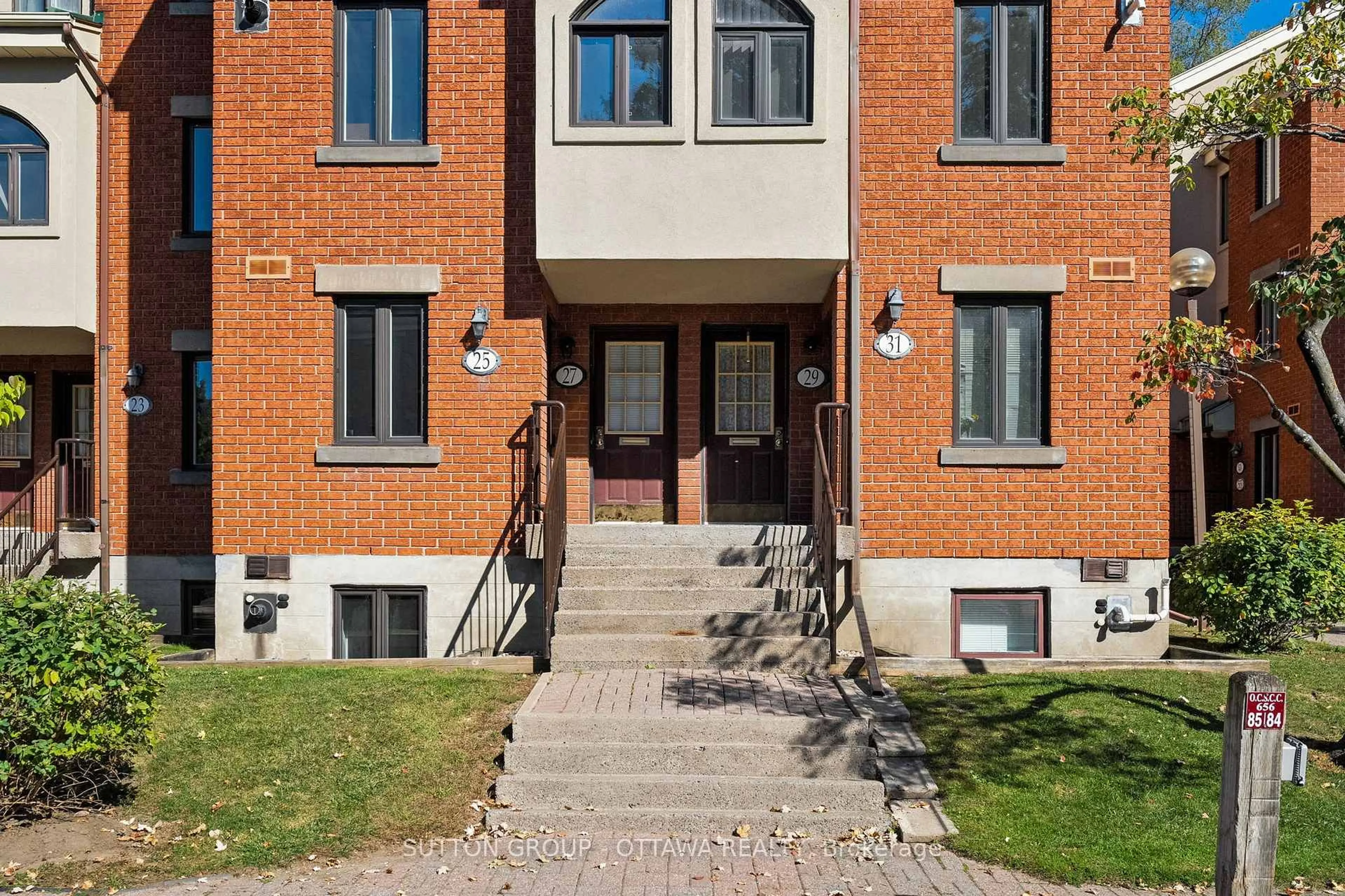 Home with brick exterior material, street for 25 Crispin Private, Ottawa Ontario K1K 2T7