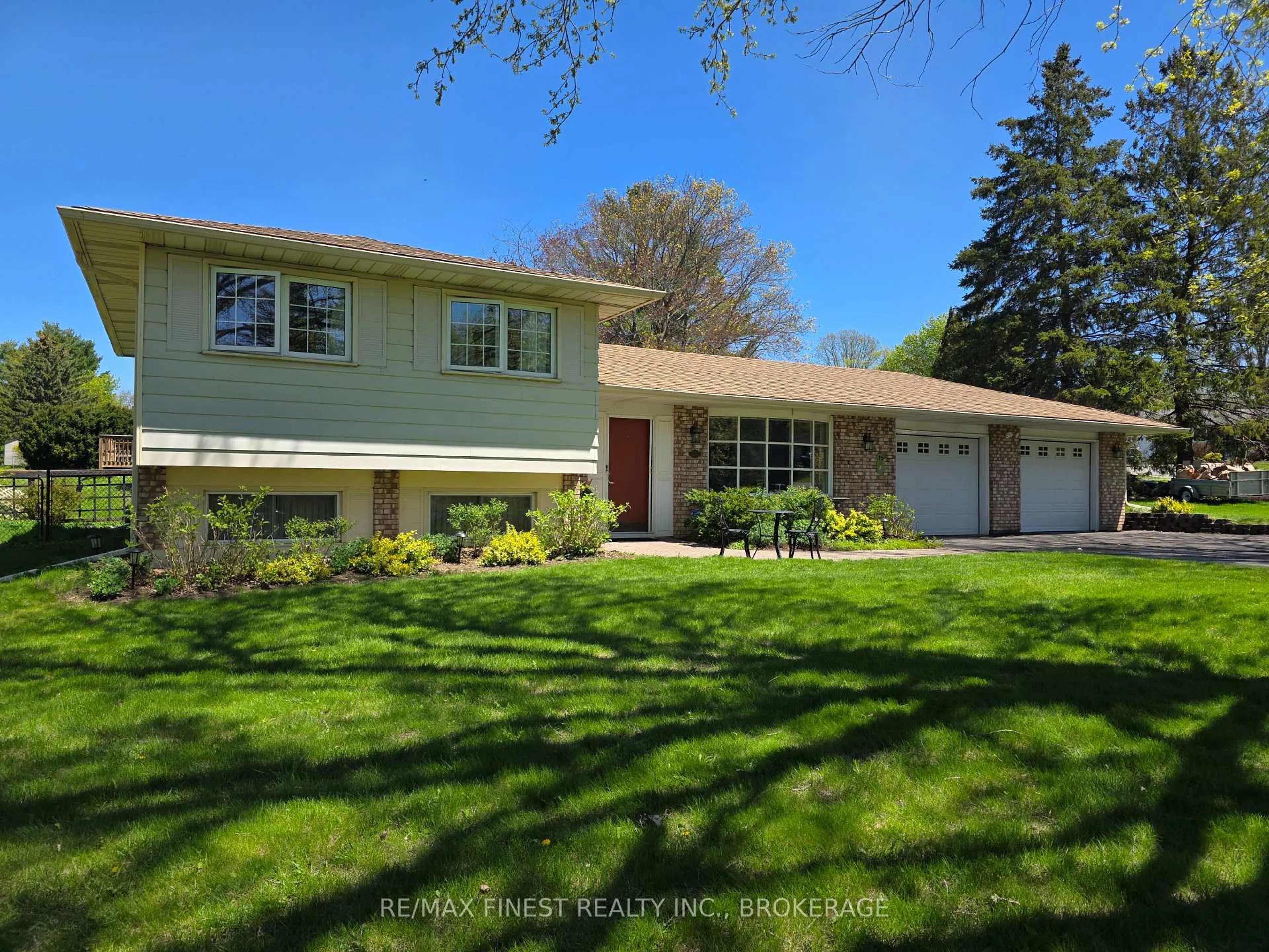 Home with vinyl exterior material, street for 15 Edgewood Dr, Greater Napanee Ontario K7R 3K3