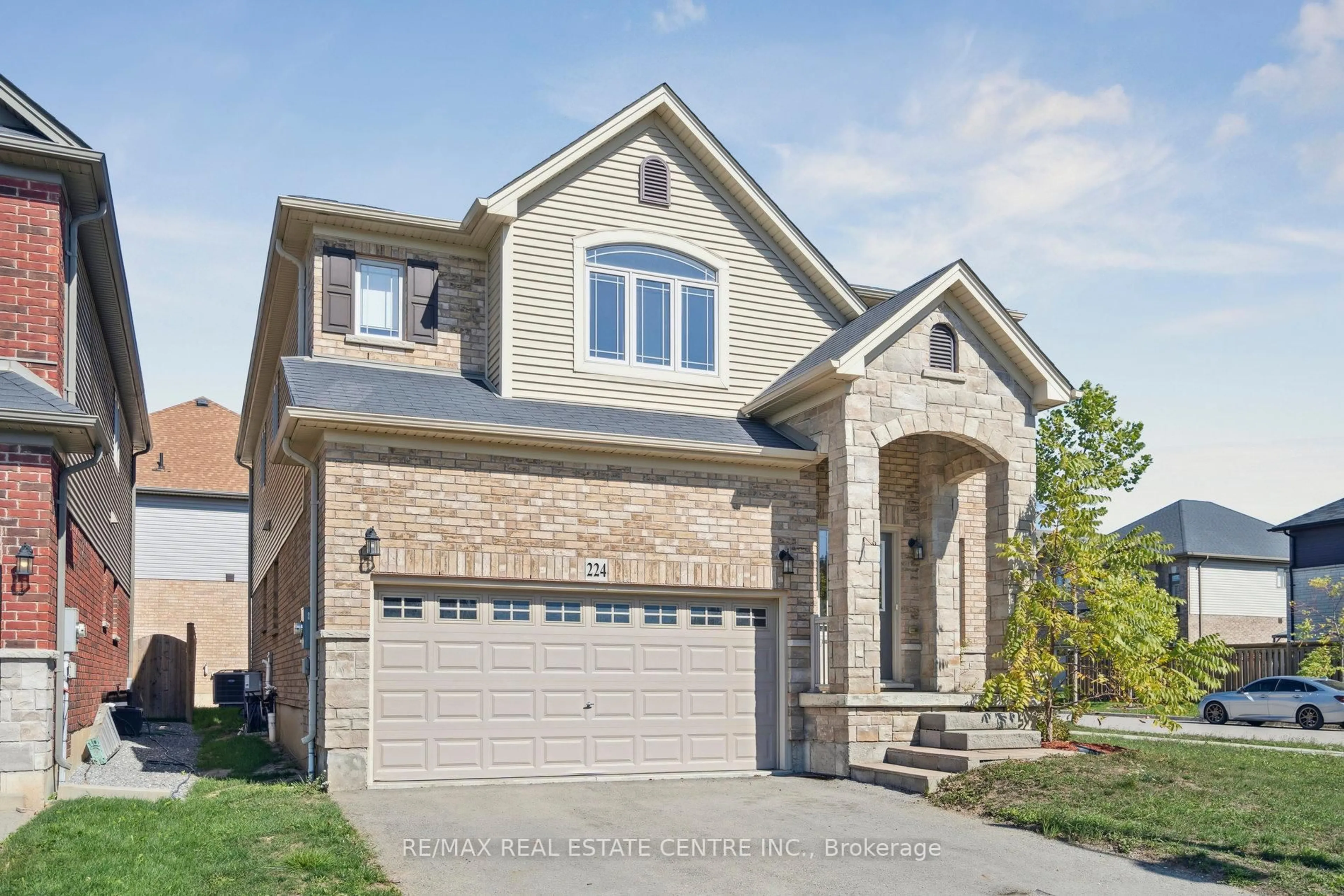 Home with brick exterior material, street for 224 Pumpkin Pass, Hamilton Ontario L0R 1C0