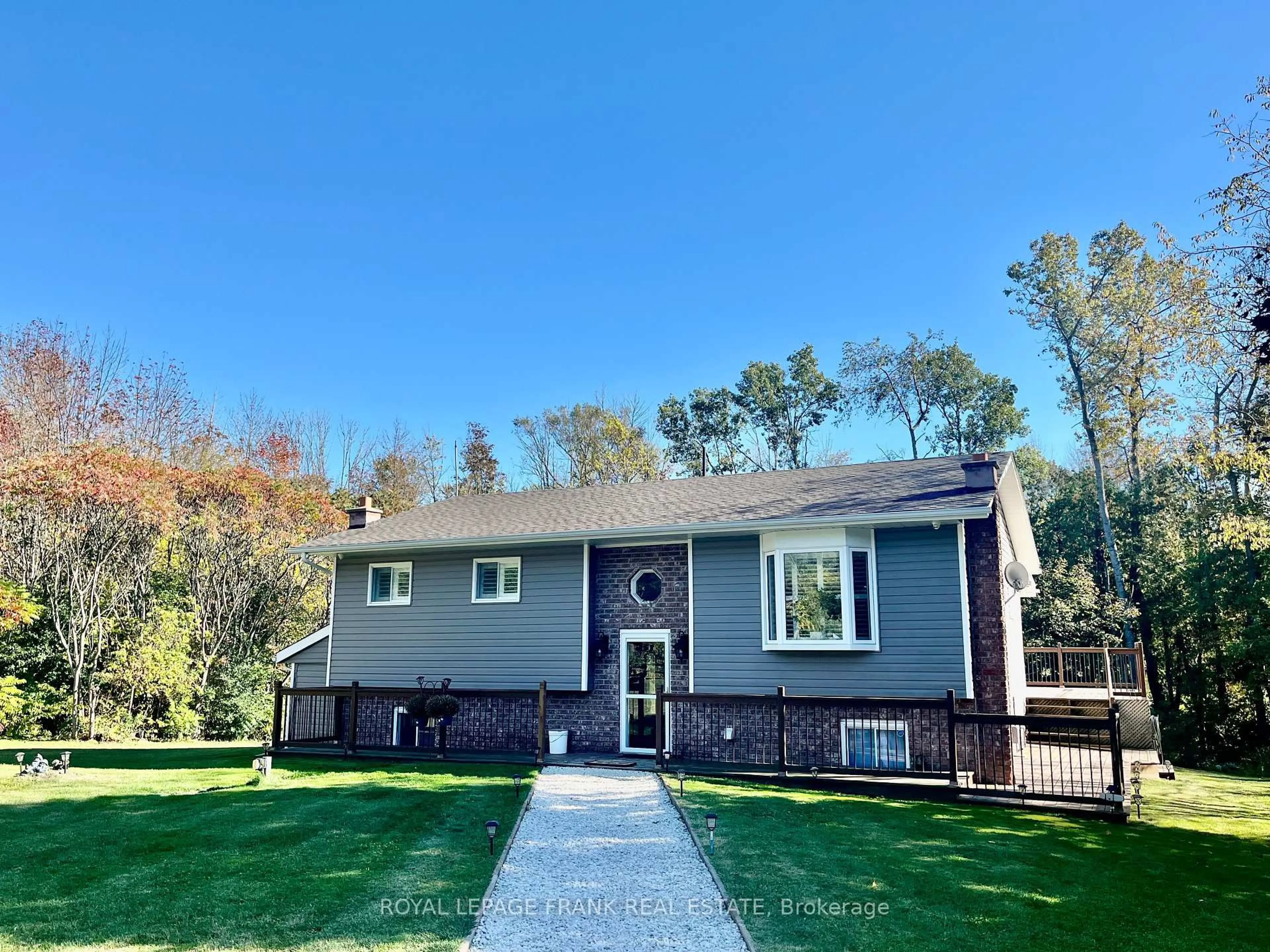 Home with vinyl exterior material, street for 15359 Little Lake Rd, Brighton Ontario K0K 1H0