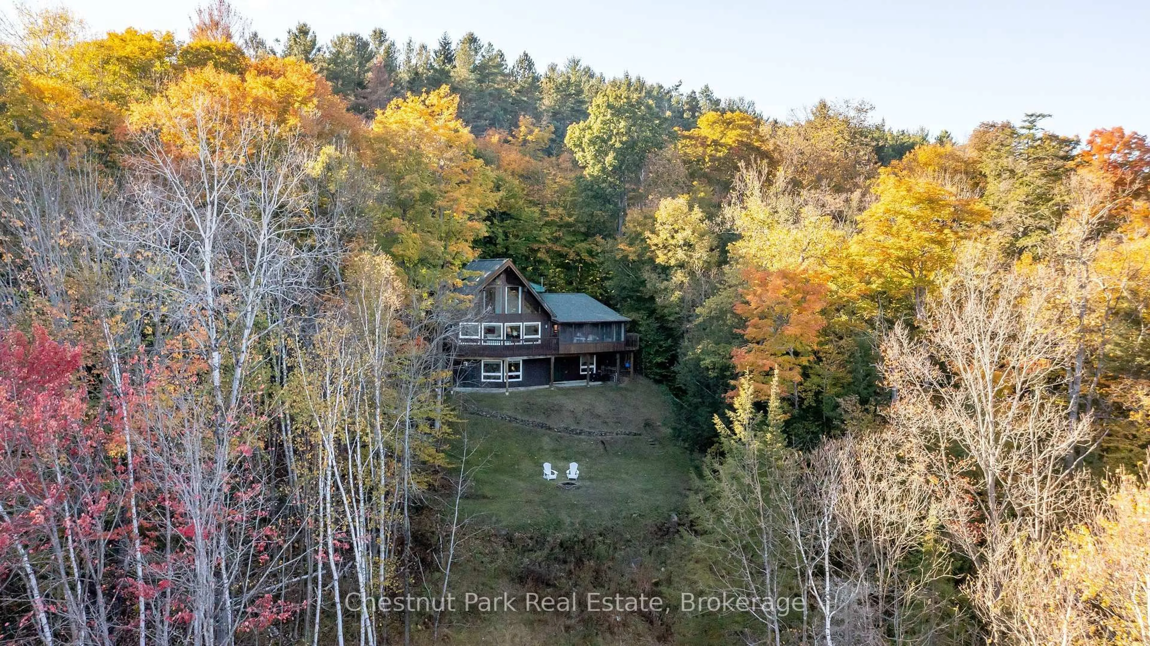 A pic from outside/outdoor area/front of a property/back of a property/a pic from drone, unknown for 1033 Point Ideal Rd, Lake of Bays Ontario P0A 1H0
