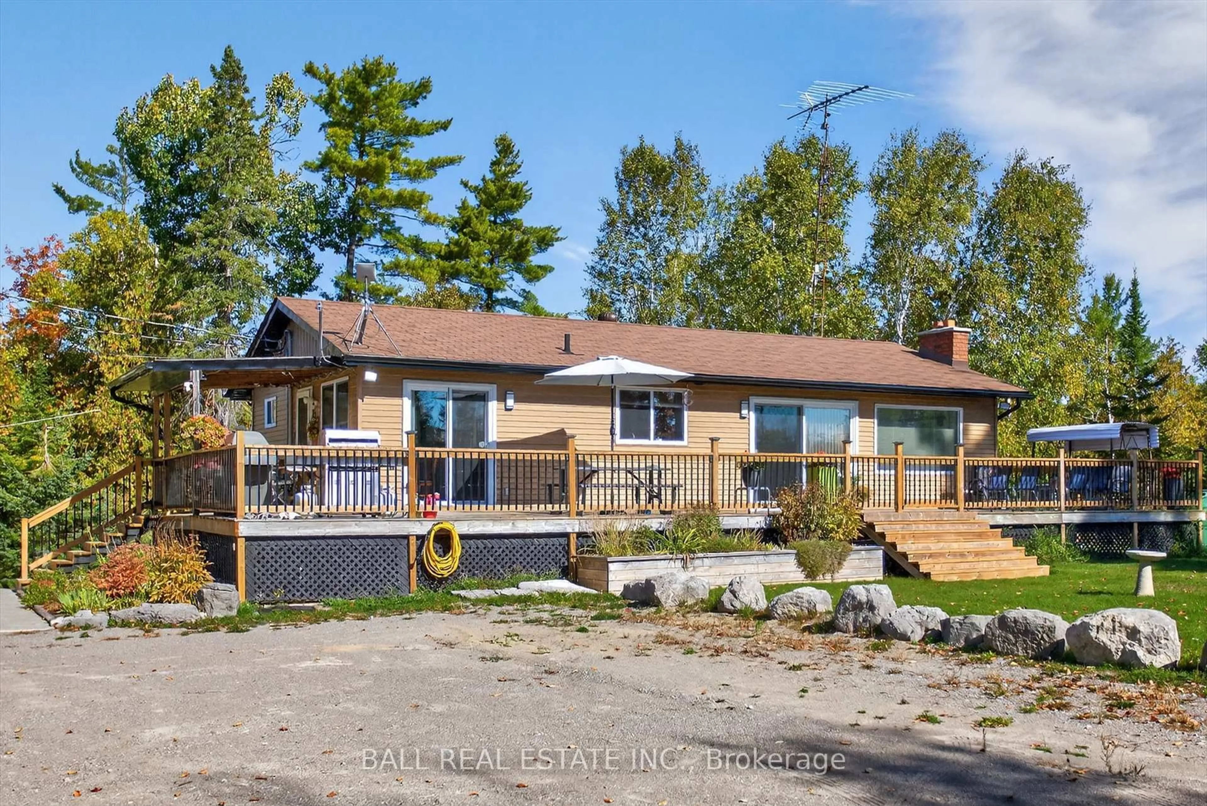 A pic from outside/outdoor area/front of a property/back of a property/a pic from drone, water/lake/river/ocean view for 1352 County Rd 49 Rd, Trent Lakes Ontario K0M 1A0