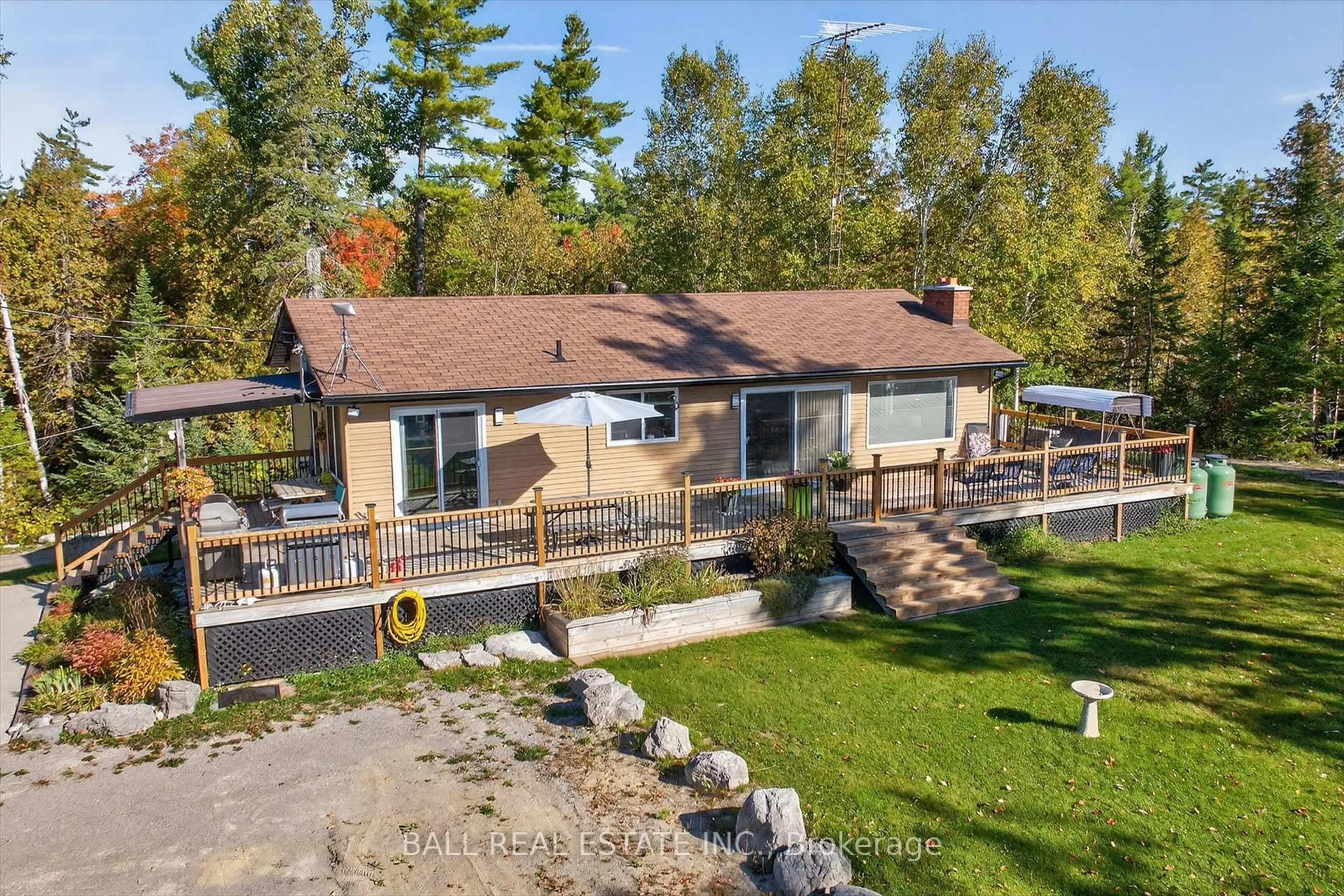 A pic from outside/outdoor area/front of a property/back of a property/a pic from drone, unknown for 1352 County Rd 49 Rd, Trent Lakes Ontario K0M 1A0