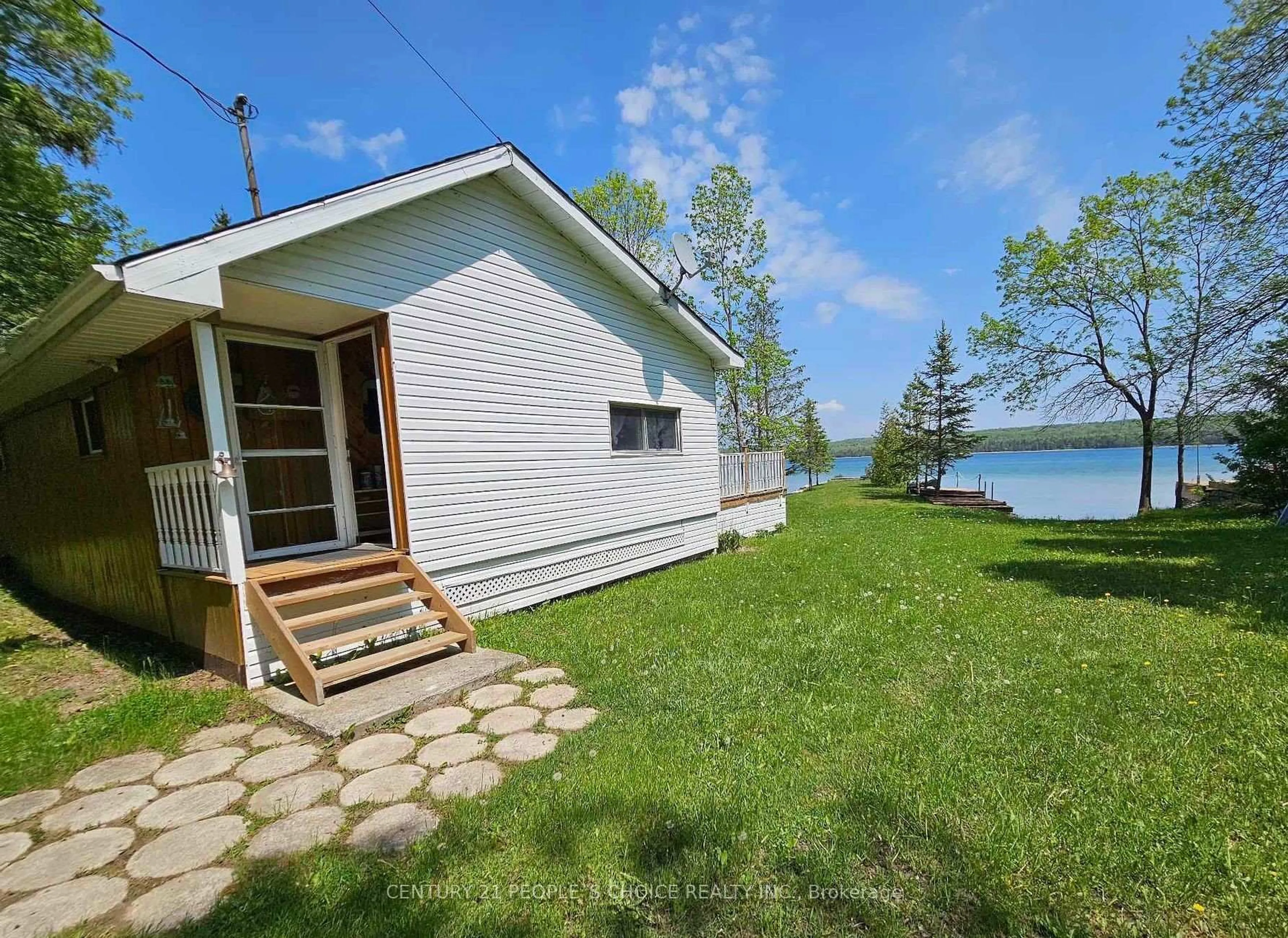 Patio, water/lake/river/ocean view for 123 Waterview Lane, Assiginack Ontario P0P 1N0