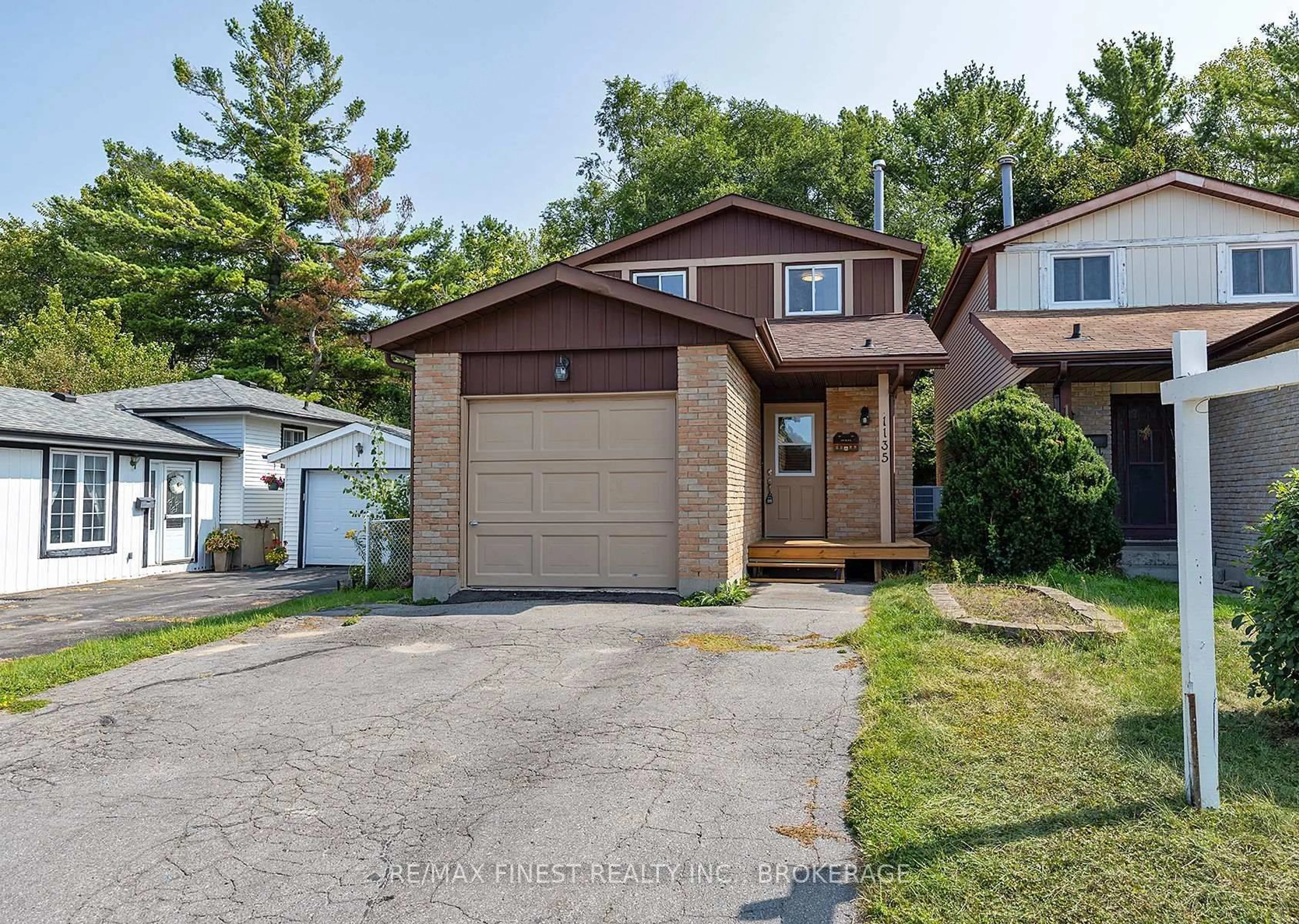 Home with vinyl exterior material, street for 1135 Basswood Pl, Kingston Ontario K7P 1K4