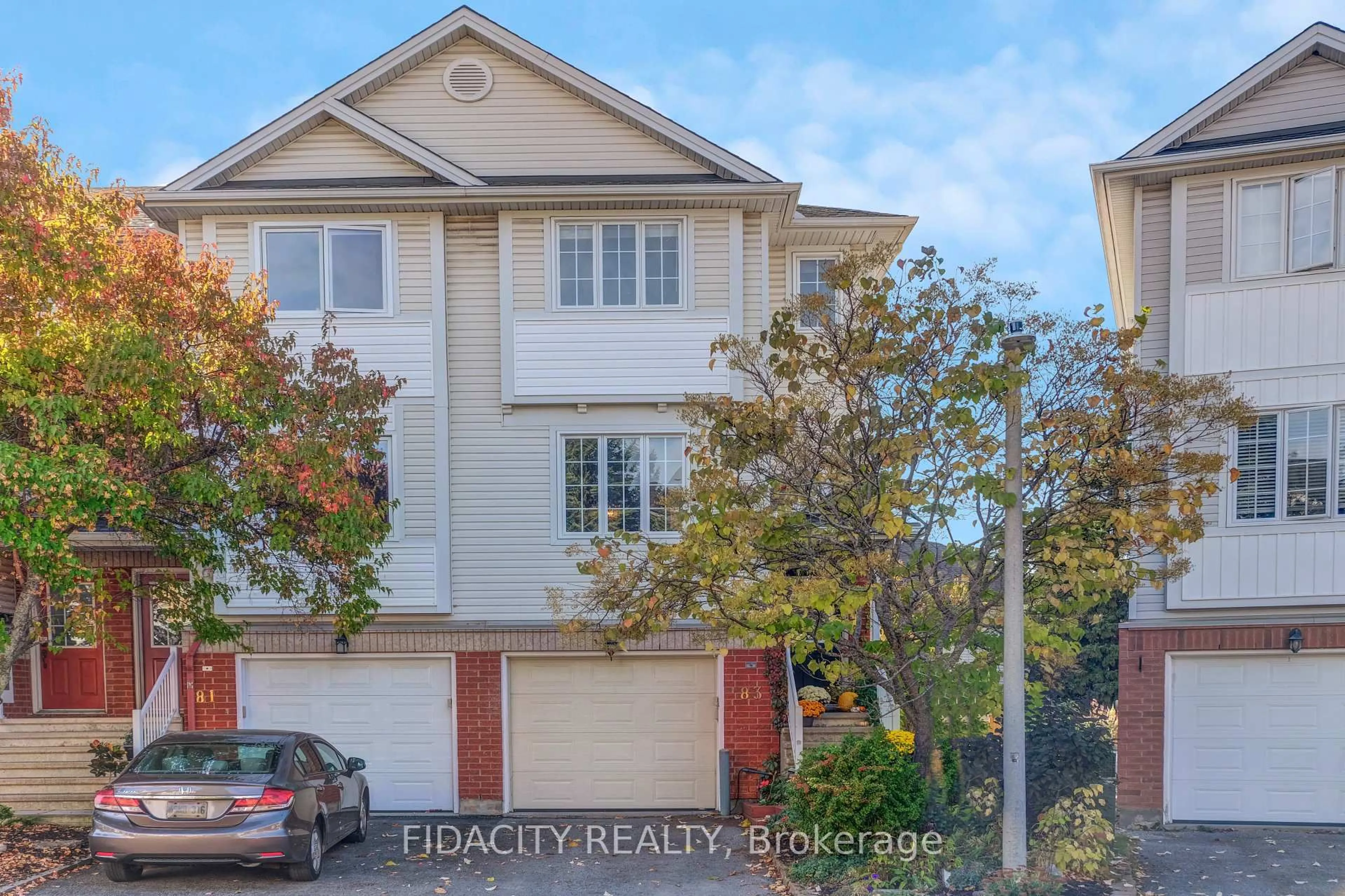 A pic from outside/outdoor area/front of a property/back of a property/a pic from drone, street for 83 Manhattan Cres, Ottawa Ontario K2C 4B8
