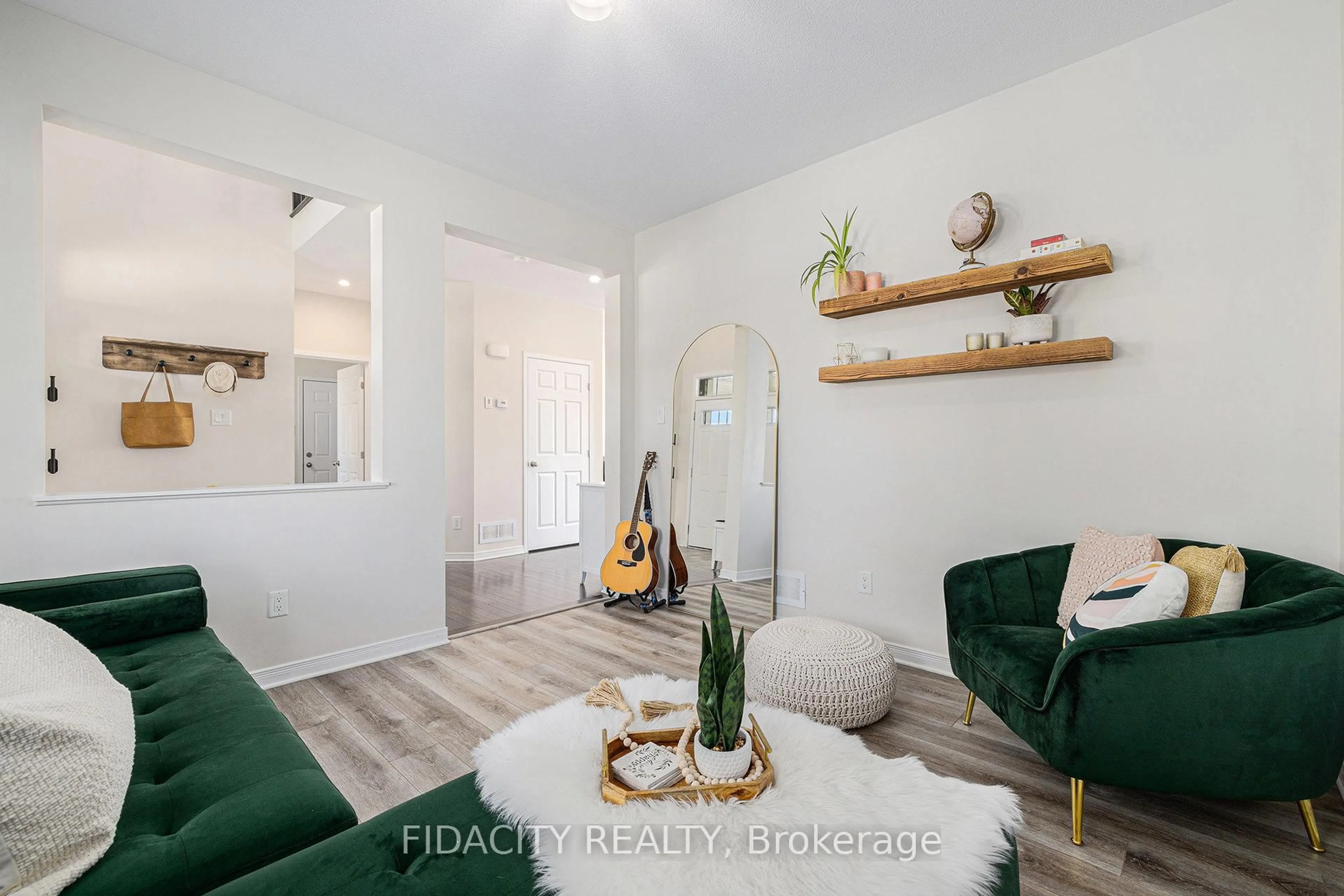 Living room with furniture, wood/laminate floor for 72 White Tail Dr, Almonte Ontario K0A 1A0