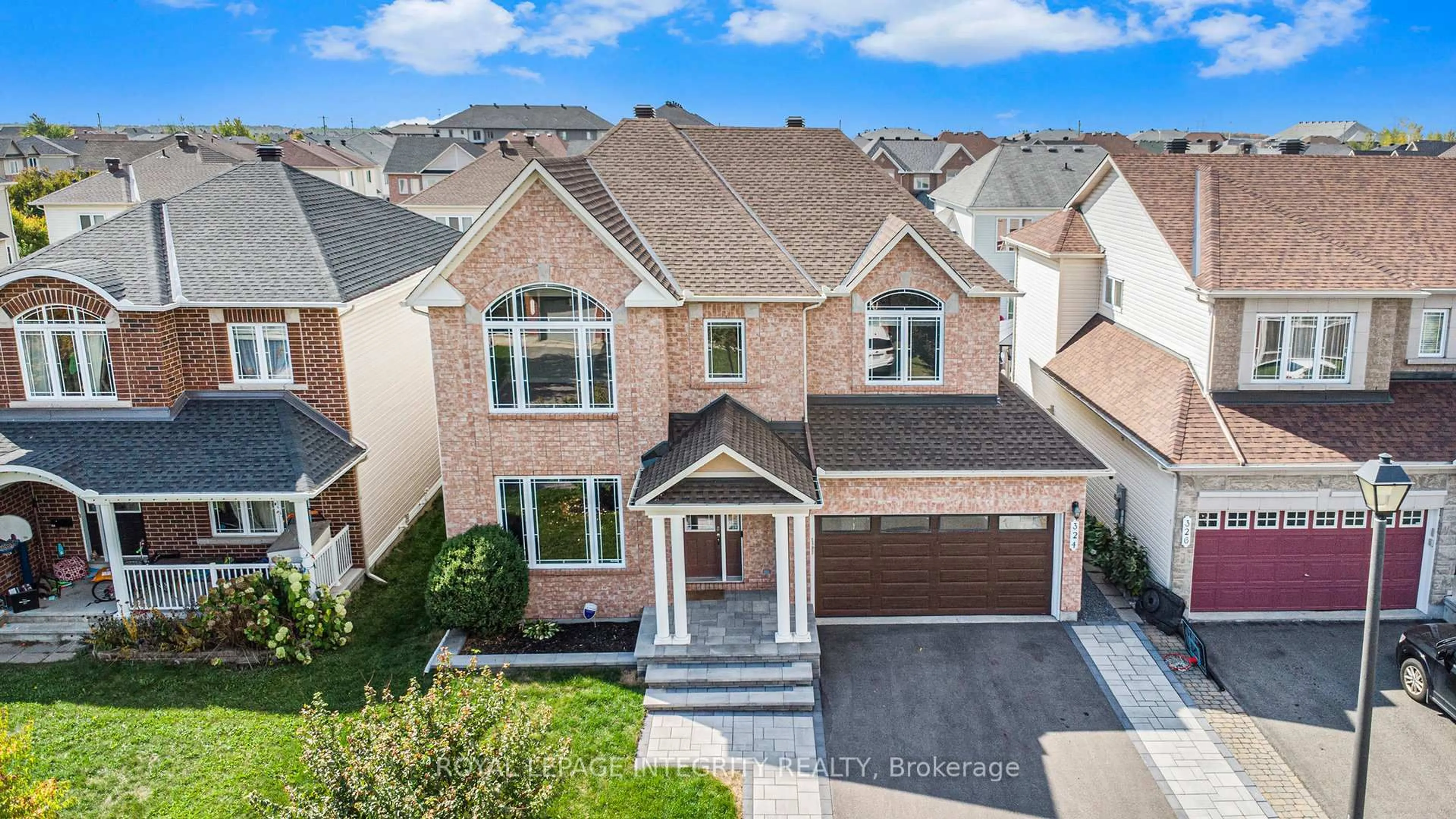 A pic from outside/outdoor area/front of a property/back of a property/a pic from drone, street for 324 Branthaven St, Ottawa Ontario K4A 0H1