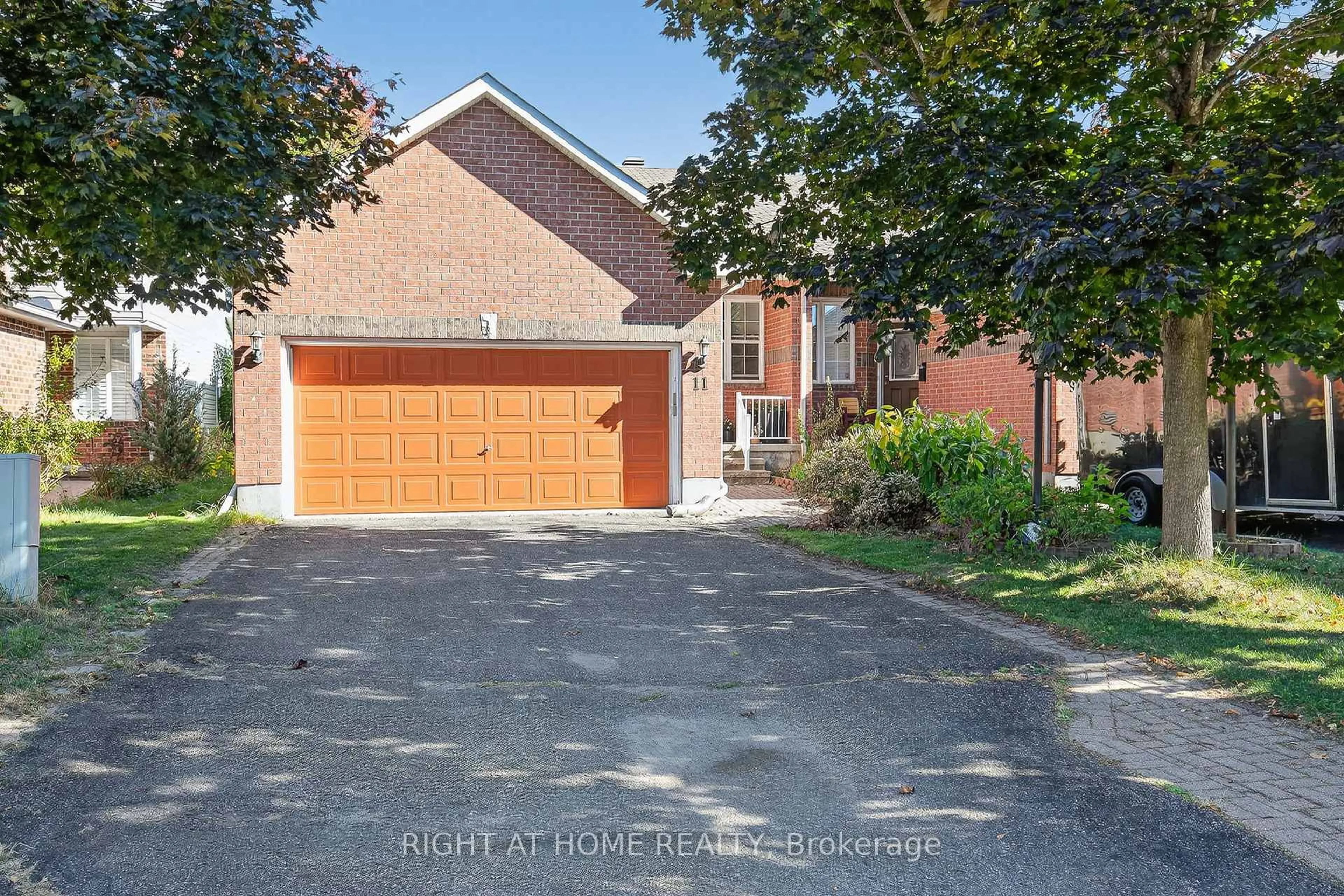 Home with brick exterior material, street for 11 Oriska Way, Nepean Ontario K2J 4N7