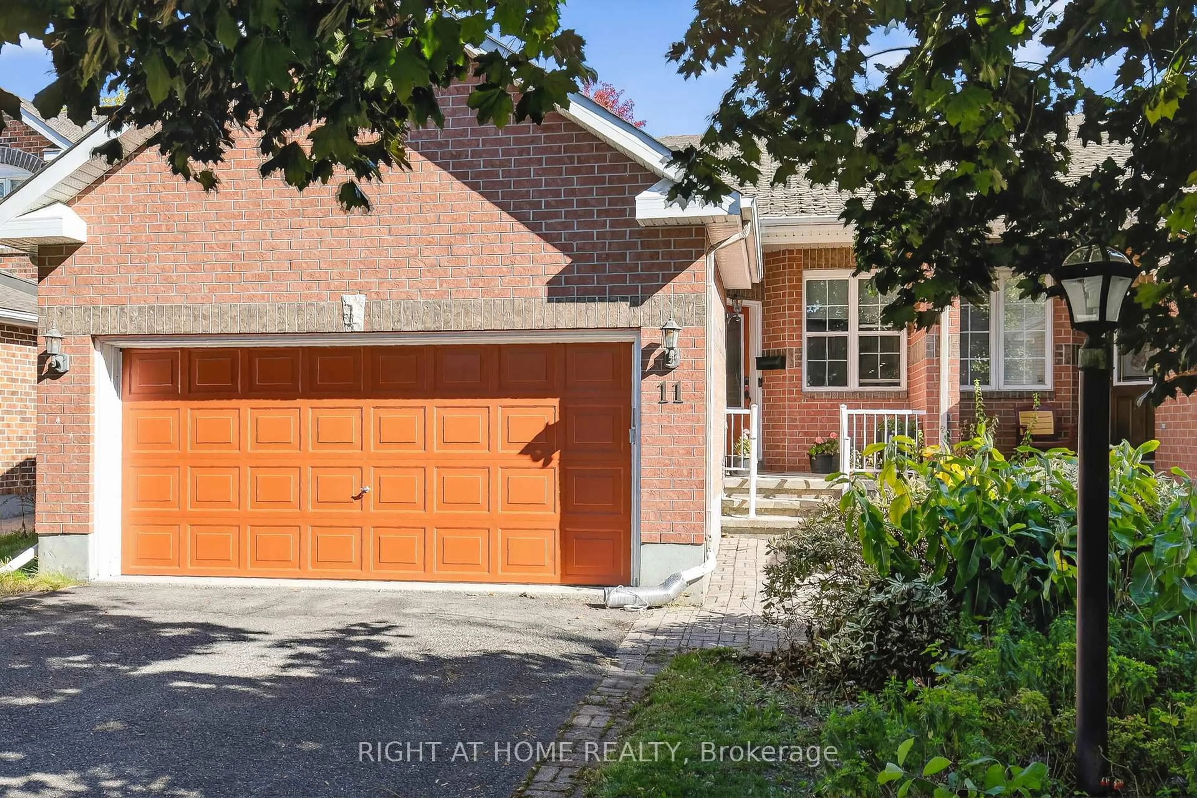 Home with brick exterior material, street for 11 Oriska Way, Nepean Ontario K2J 4N7