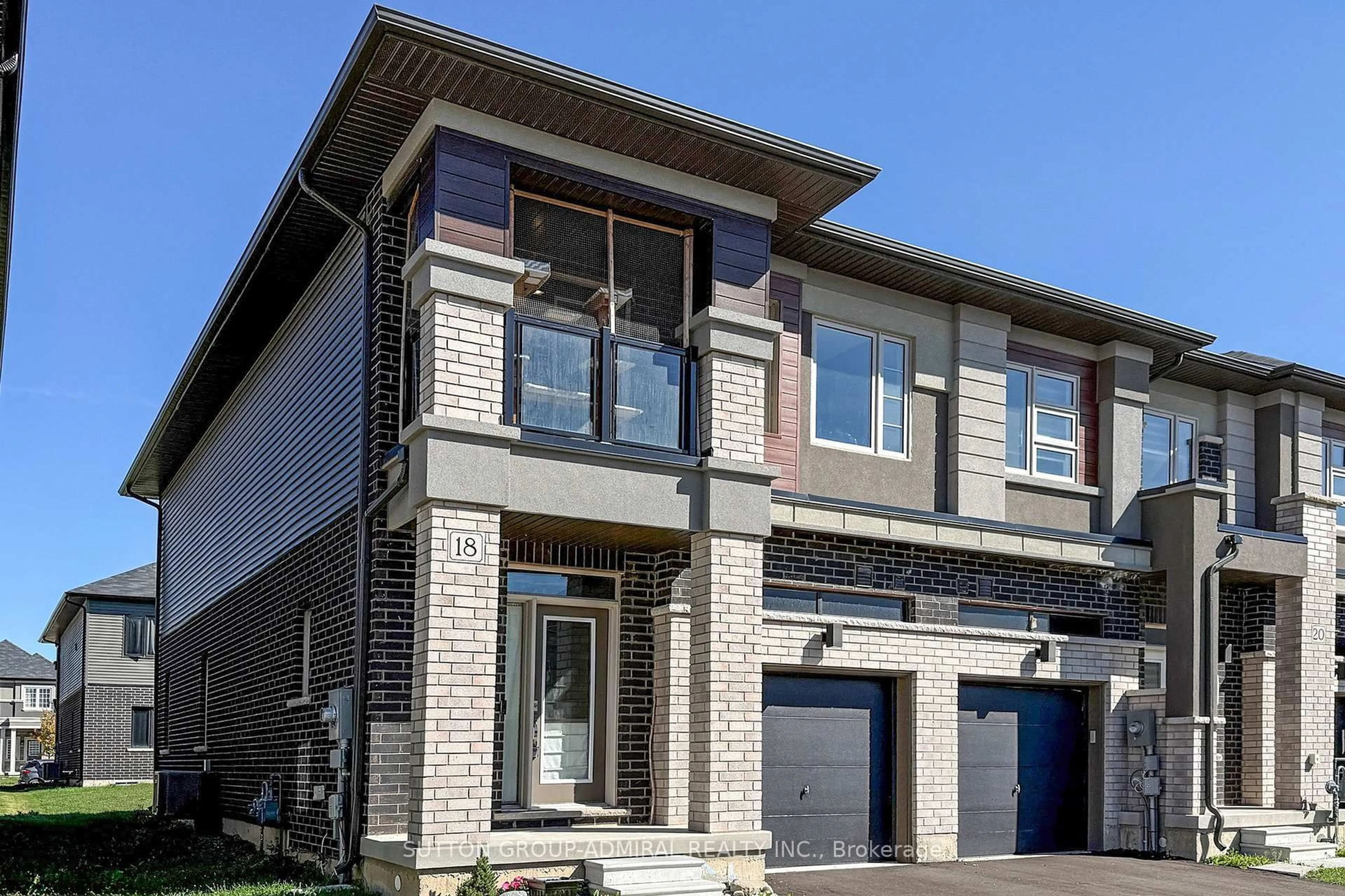 Home with brick exterior material, street for 18 Copeman Ave, Brantford Ontario N3V 0B3