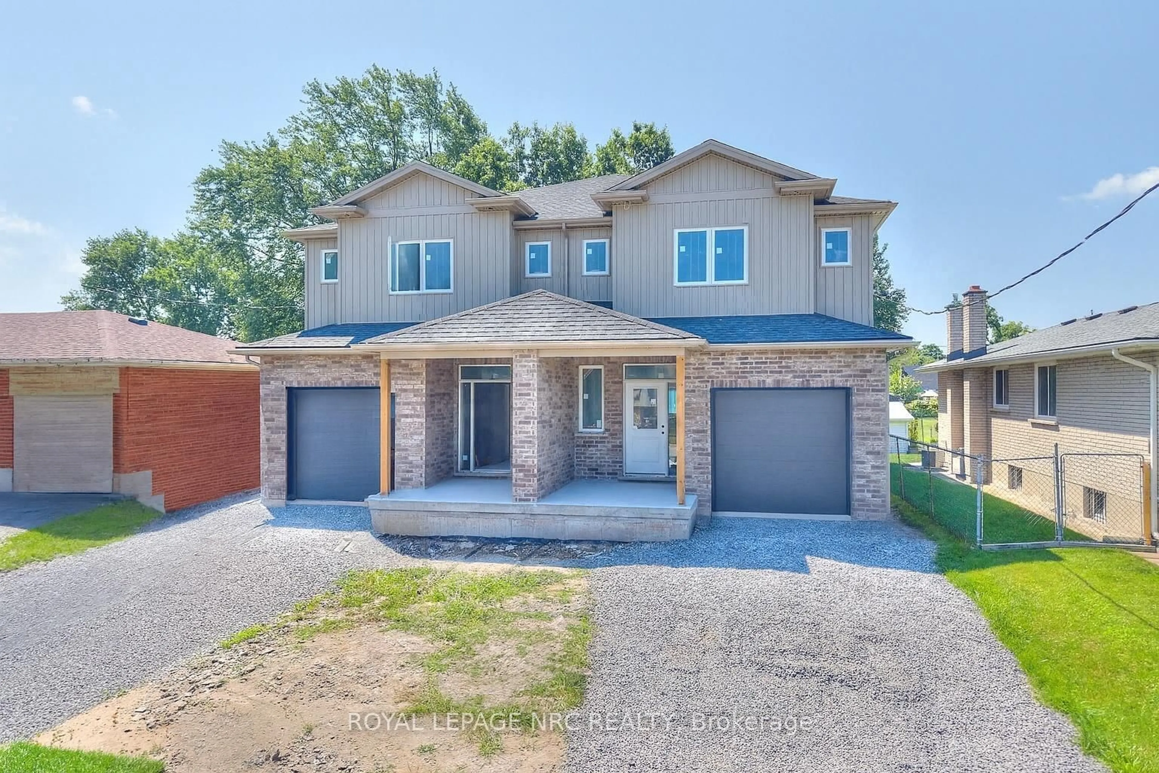 Home with brick exterior material, street for 6668 Hawkins St, Niagara Falls Ontario L2G 3B7