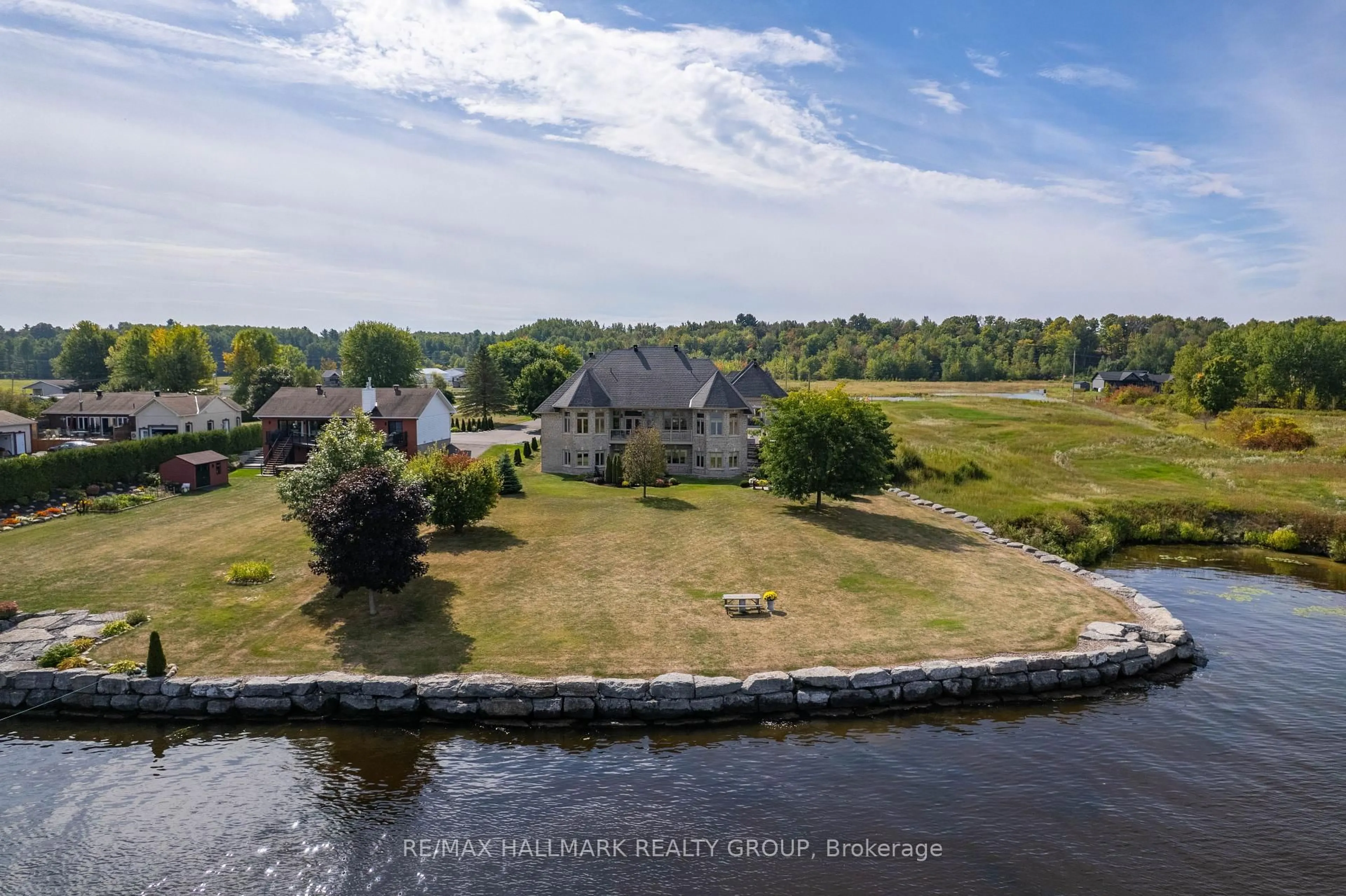 A pic from outside/outdoor area/front of a property/back of a property/a pic from drone, water/lake/river/ocean view for 3285 Front Rd, East Hawkesbury Ontario K6A 2R2