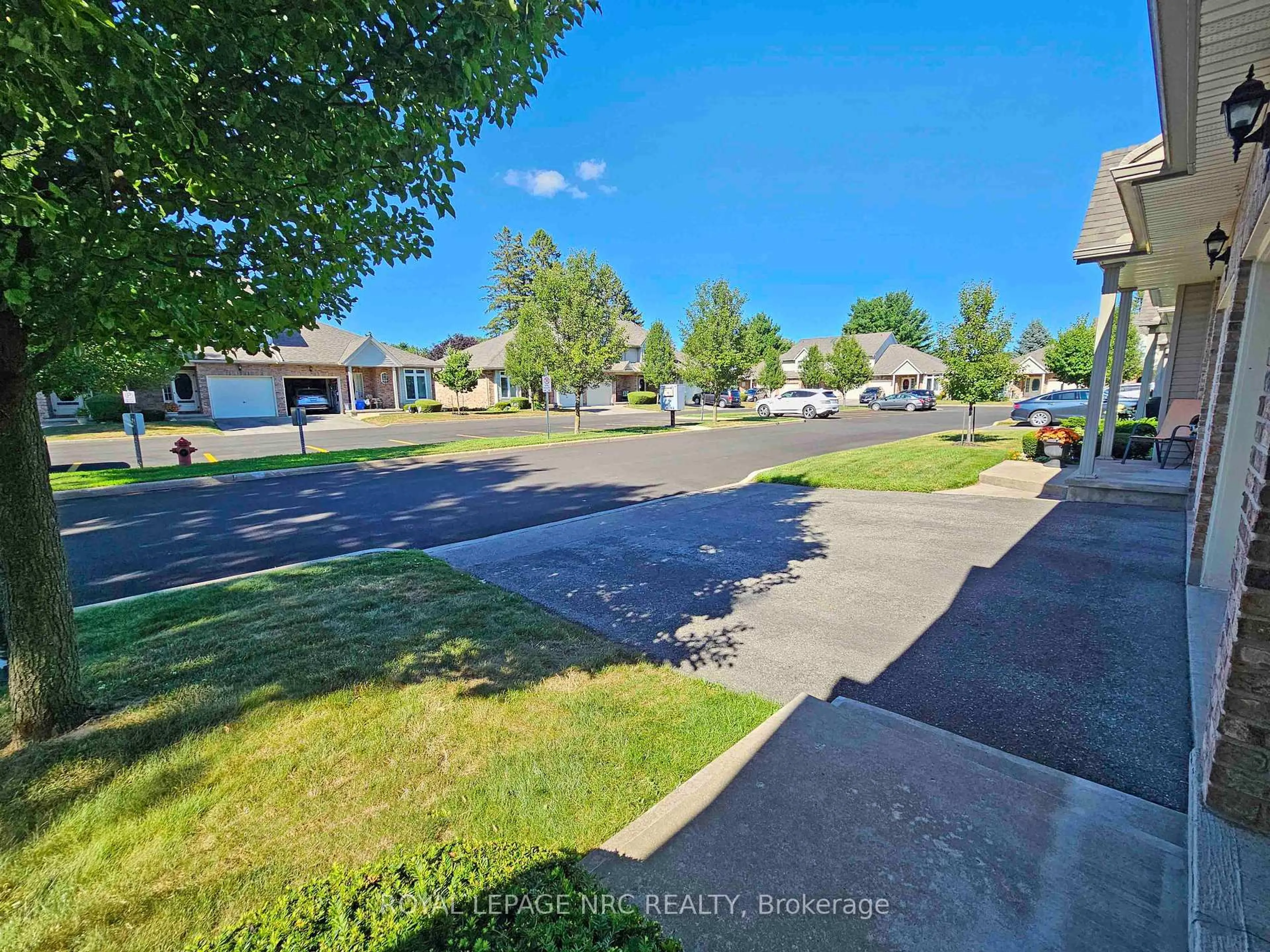 A pic from outside/outdoor area/front of a property/back of a property/a pic from drone, street for 5070 drummond Rd #28, Niagara Falls Ontario L2E 6E4