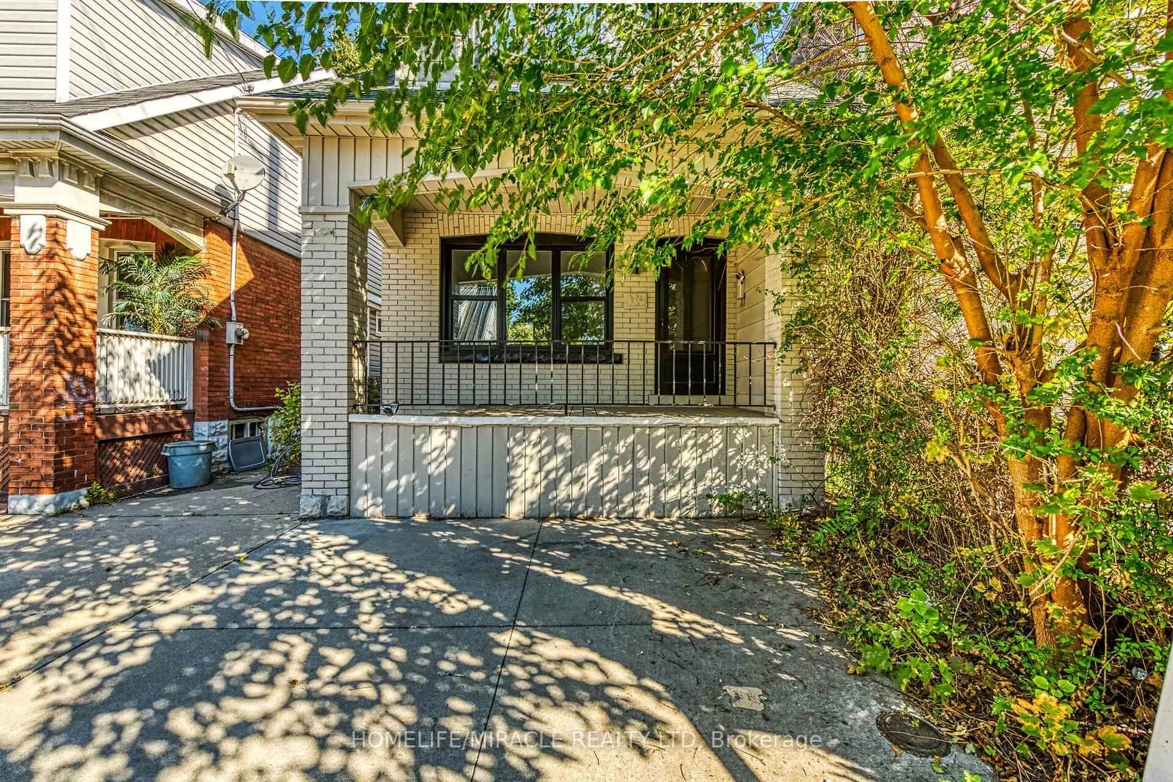 Home with brick exterior material, street for 463 Dunsmure Rd, Hamilton Ontario L8L 1X4