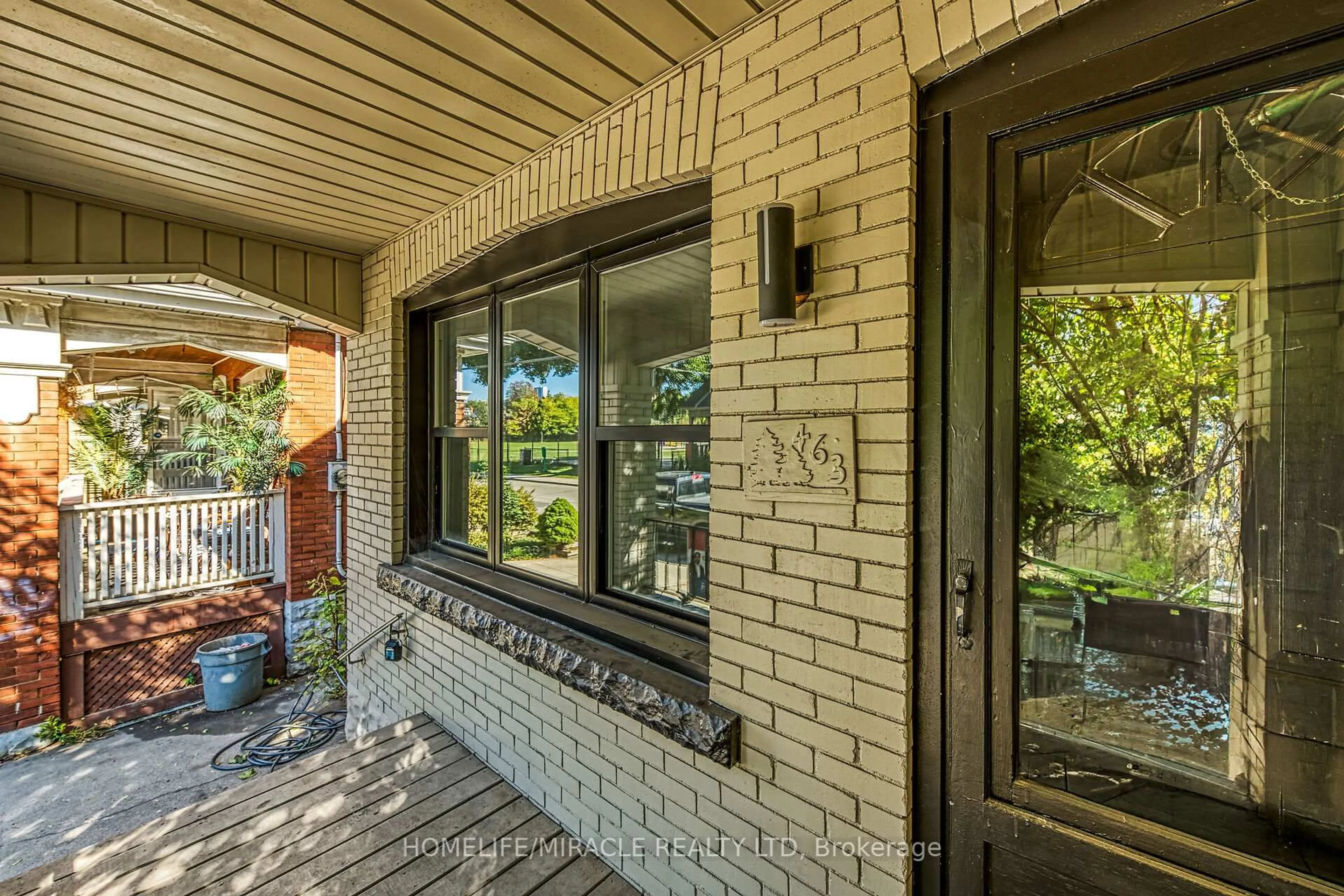 Home with brick exterior material, street for 463 Dunsmure Rd, Hamilton Ontario L8L 1X4