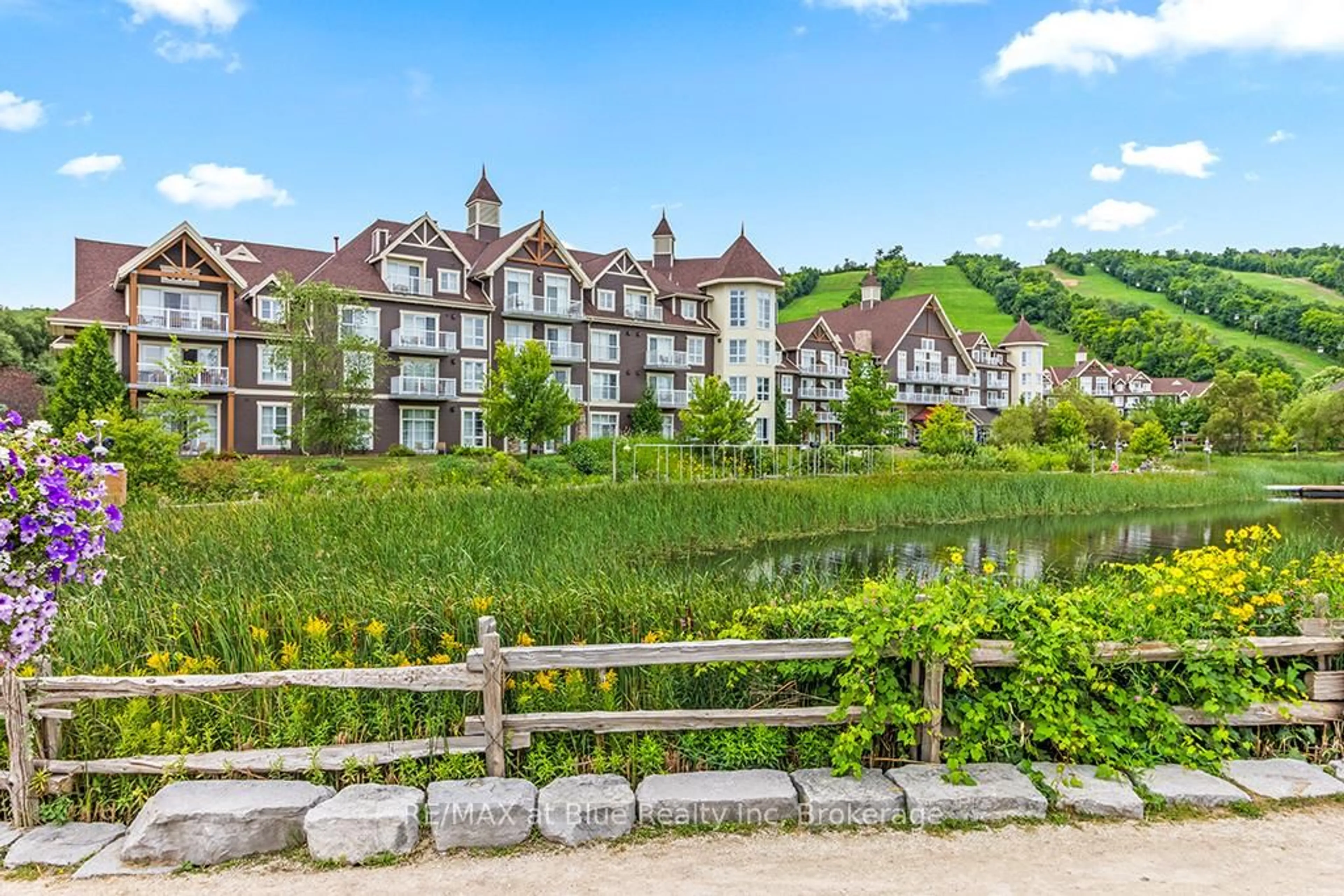 A pic from outside/outdoor area/front of a property/back of a property/a pic from drone, water/lake/river/ocean view for 220 Gord Canning Dr #265, Blue Mountains Ontario L9Y 0V2