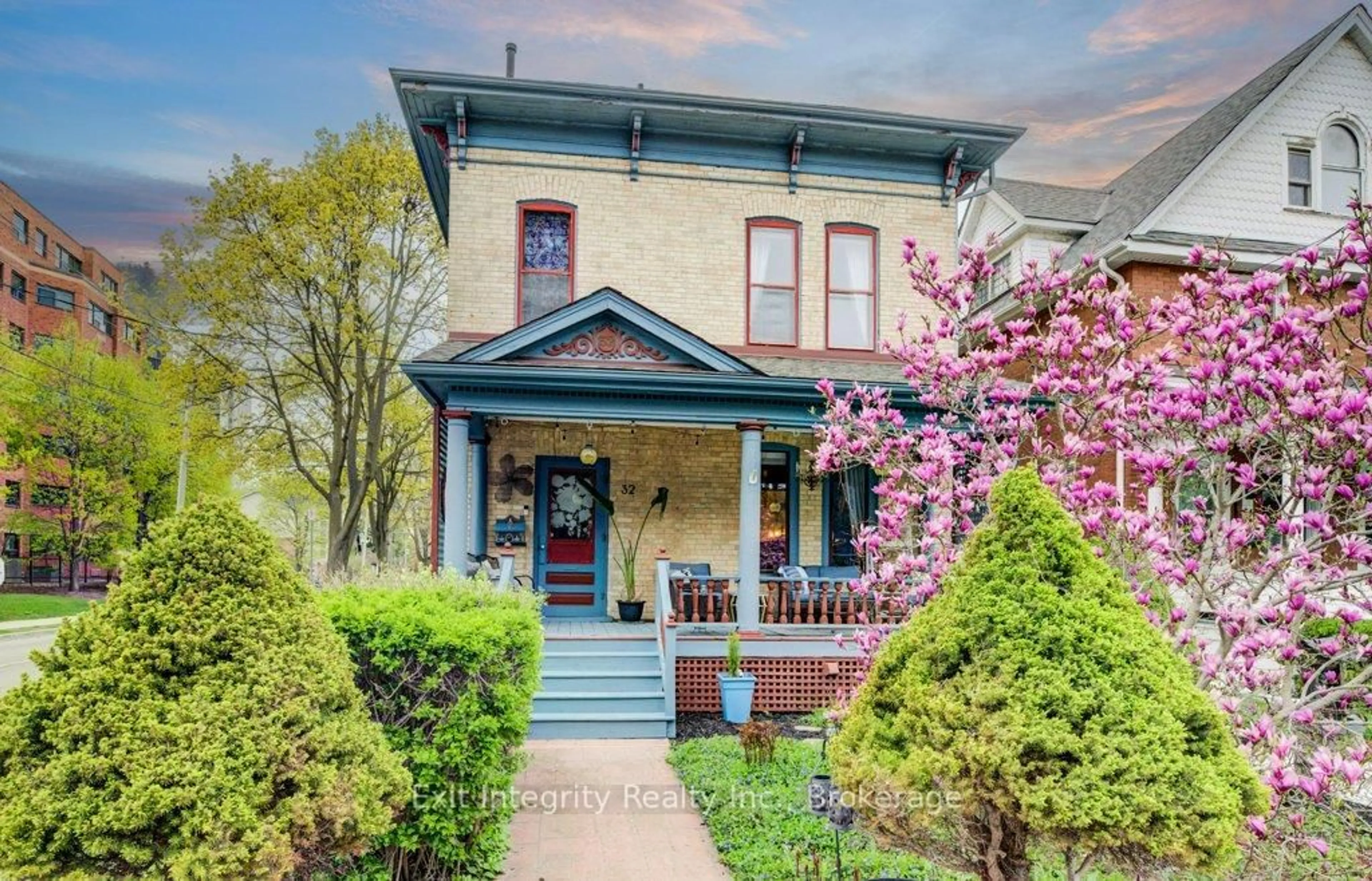 Home with brick exterior material, street for 32 Ellen St, Kitchener Ontario N2H 1L4
