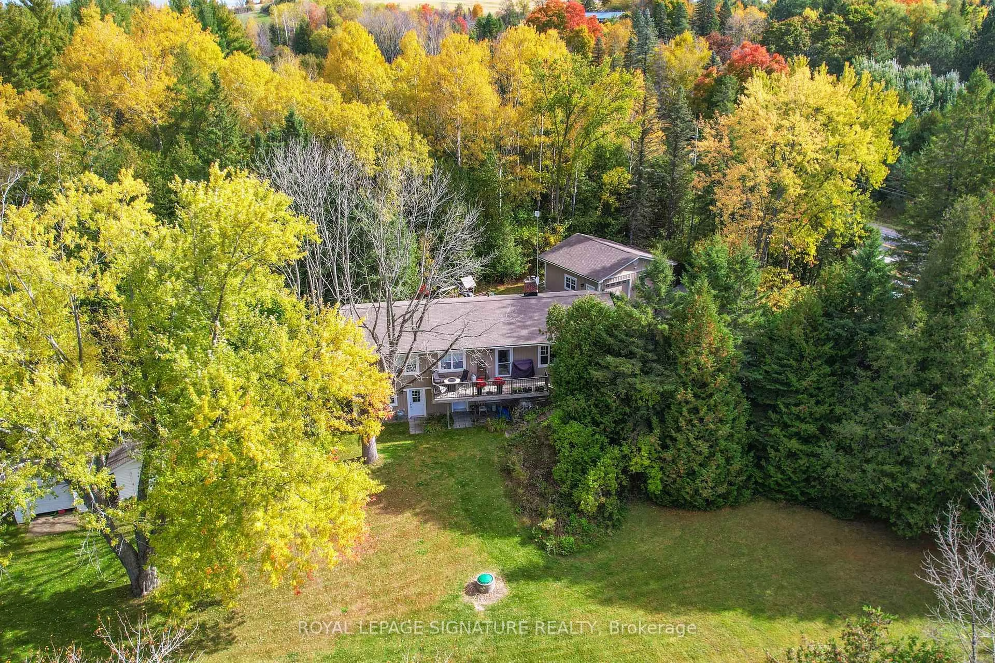 A pic from outside/outdoor area/front of a property/back of a property/a pic from drone, forest/trees view for 120 HWY 7A, Cavan Monaghan Ontario L0A 1C0