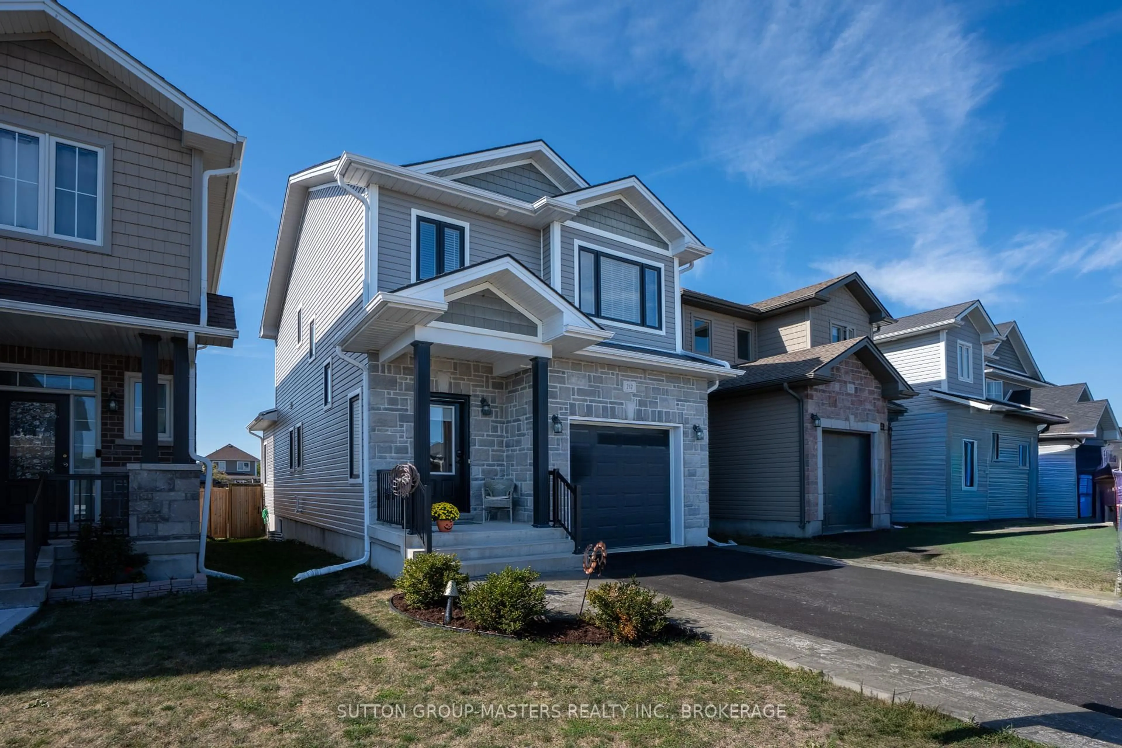 Home with vinyl exterior material, street for 217 Holden St, Kingston Ontario K7P 0L1