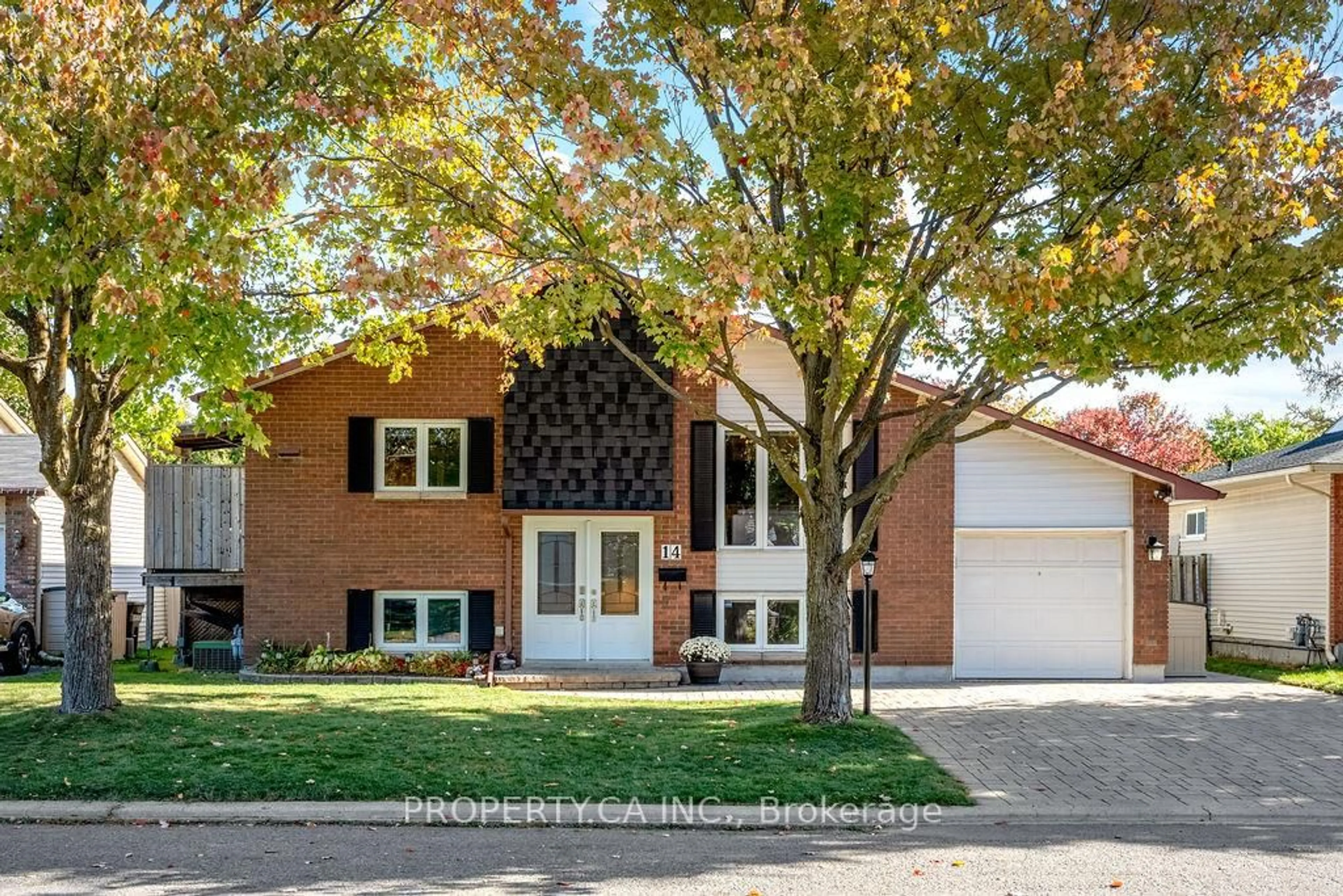 Home with brick exterior material, street for 14 Birdhill Ave, Barrhaven Ontario K2J 1Y8