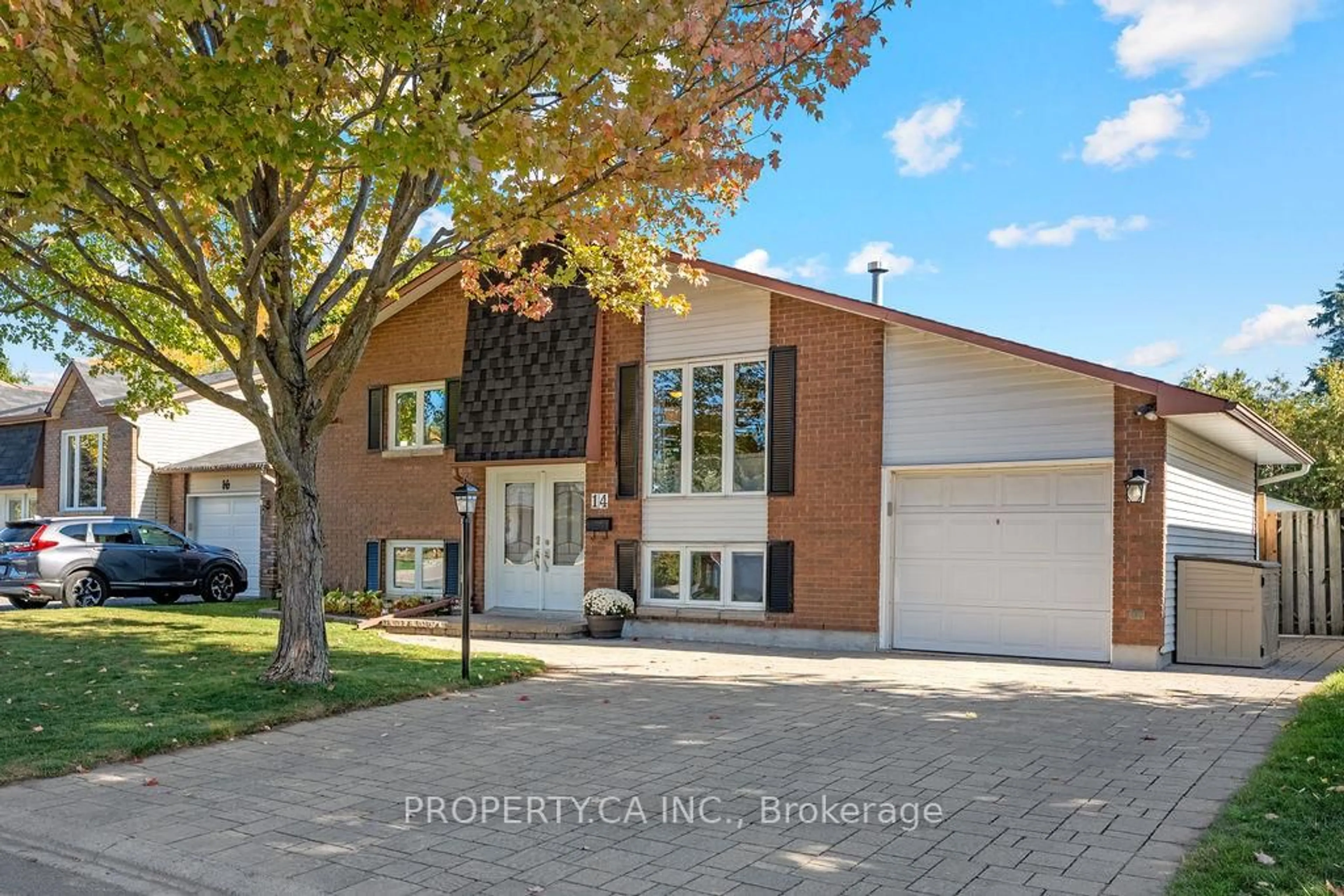 Home with brick exterior material, street for 14 Birdhill Ave, Barrhaven Ontario K2J 1Y8