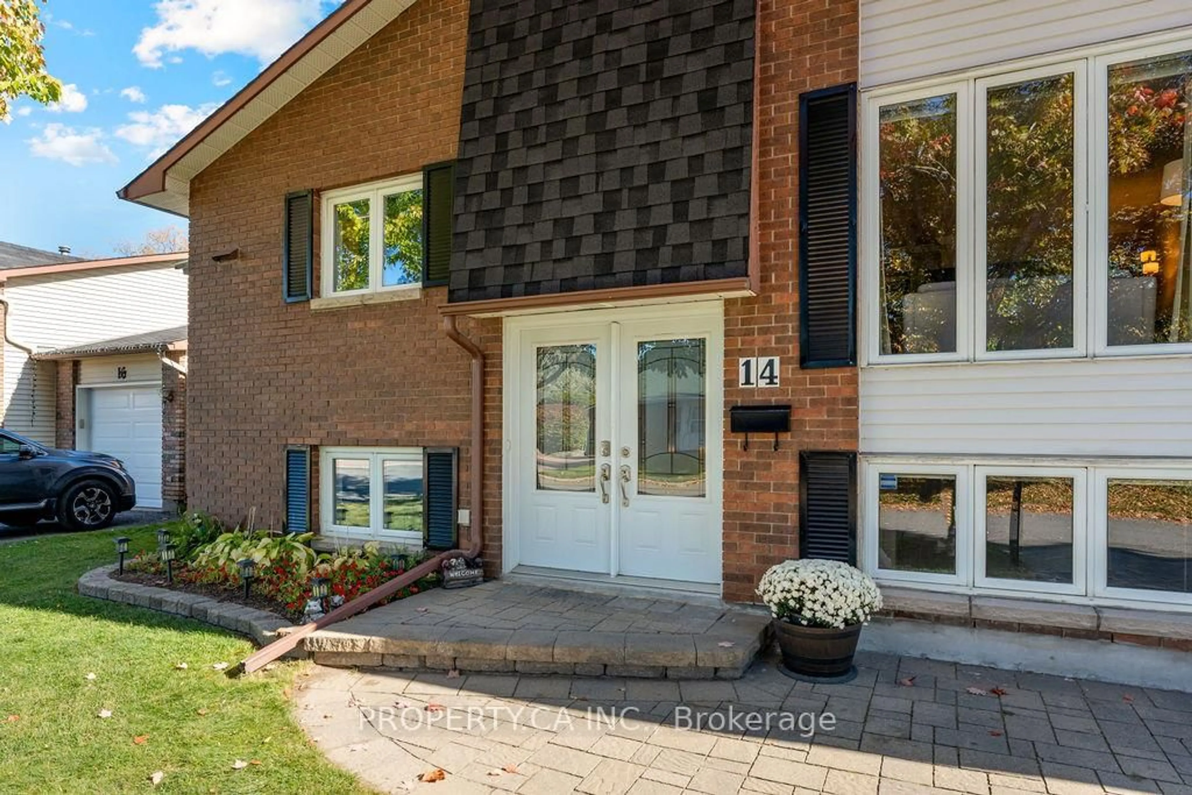 Home with brick exterior material, street for 14 Birdhill Ave, Barrhaven Ontario K2J 1Y8
