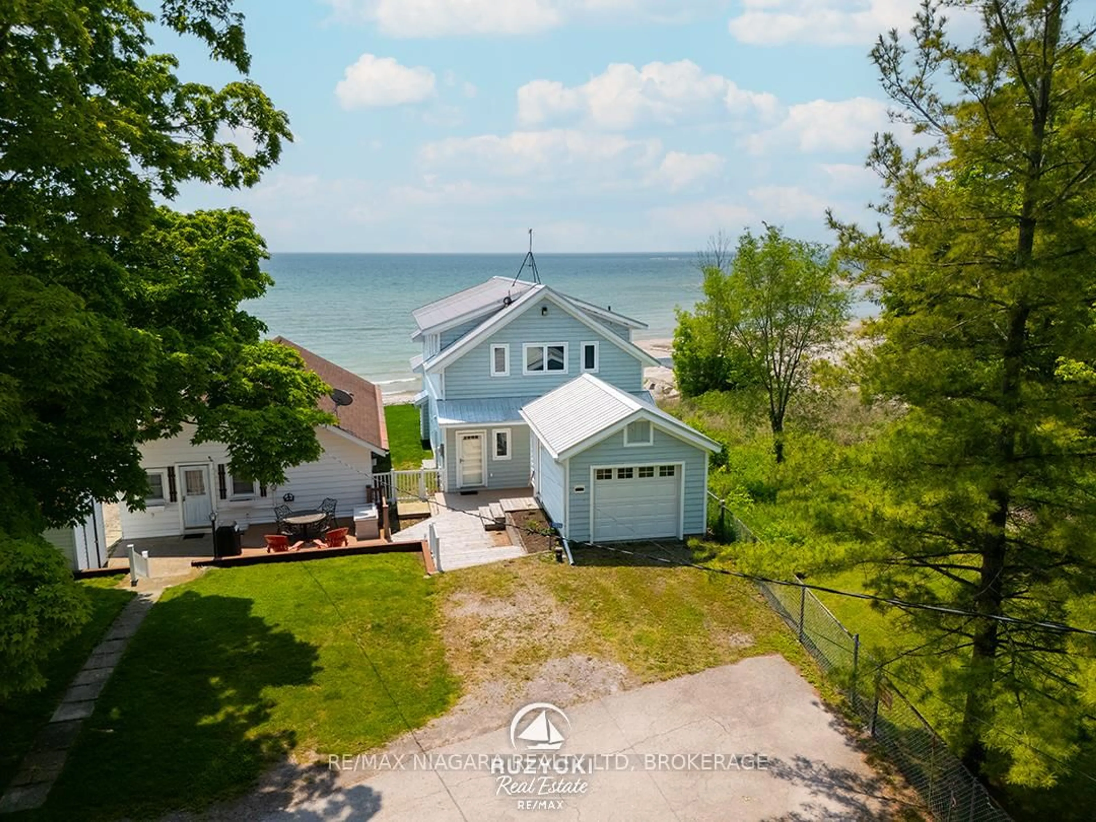 A pic from outside/outdoor area/front of a property/back of a property/a pic from drone, water/lake/river/ocean view for 12895 Old Lakeshore Rd, Wainfleet Ontario L0S 1V0