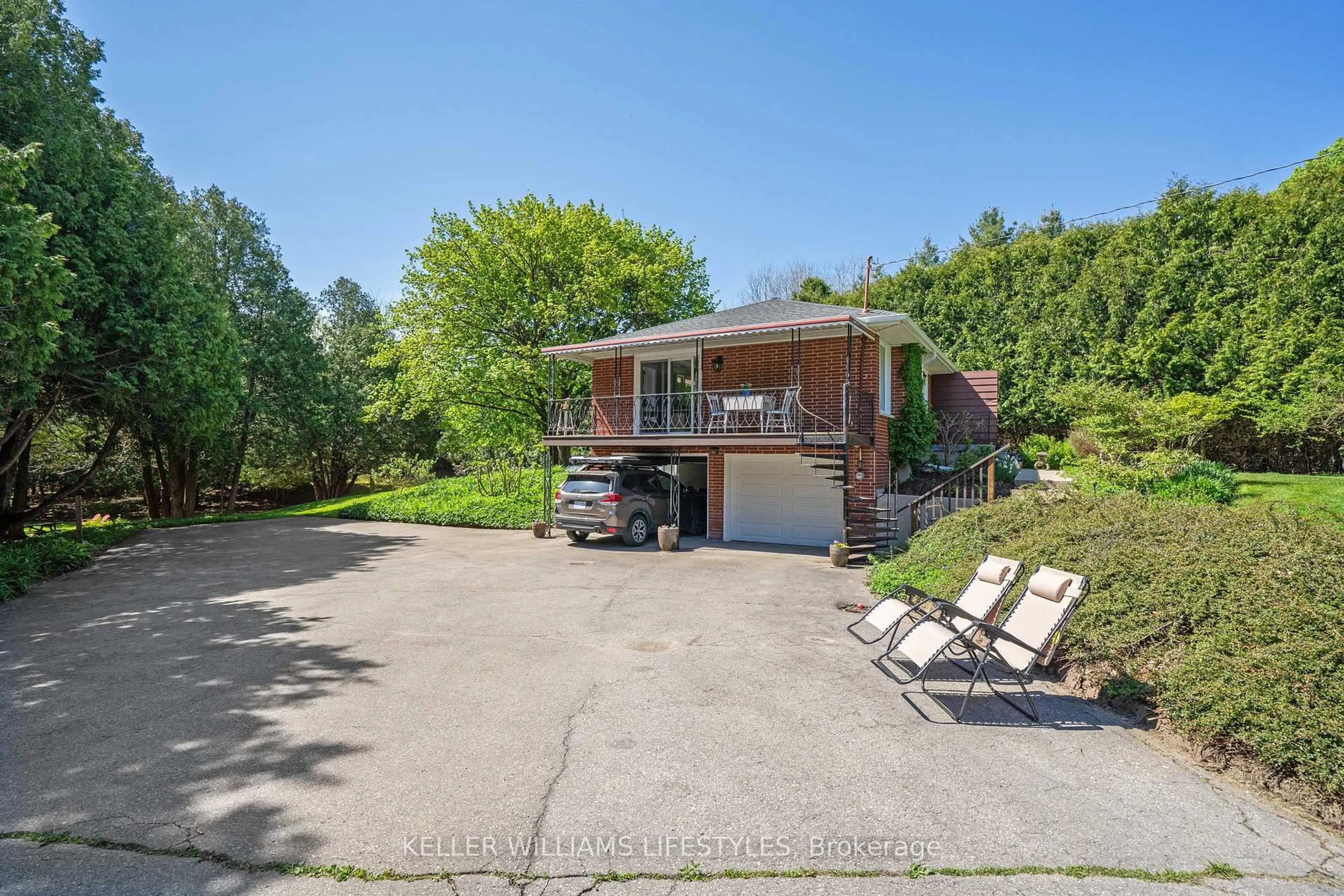 A pic from outside/outdoor area/front of a property/back of a property/a pic from drone, street for 15083 Medway Rd, Middlesex Centre Ontario N0M 1C0