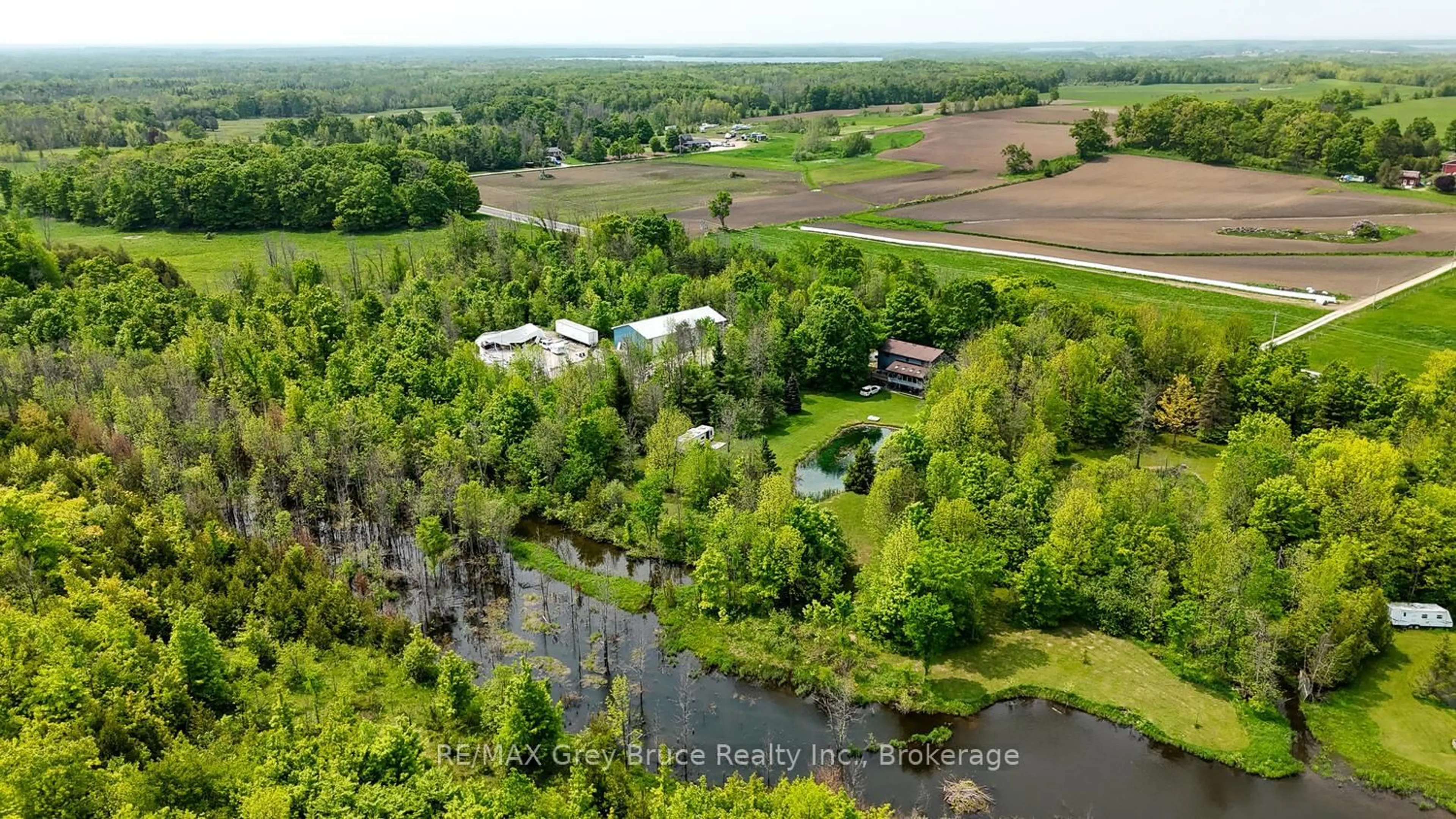 A pic from outside/outdoor area/front of a property/back of a property/a pic from drone, water/lake/river/ocean view for 1033 Bruce Road 9, South Bruce Peninsula Ontario N0H 2T0