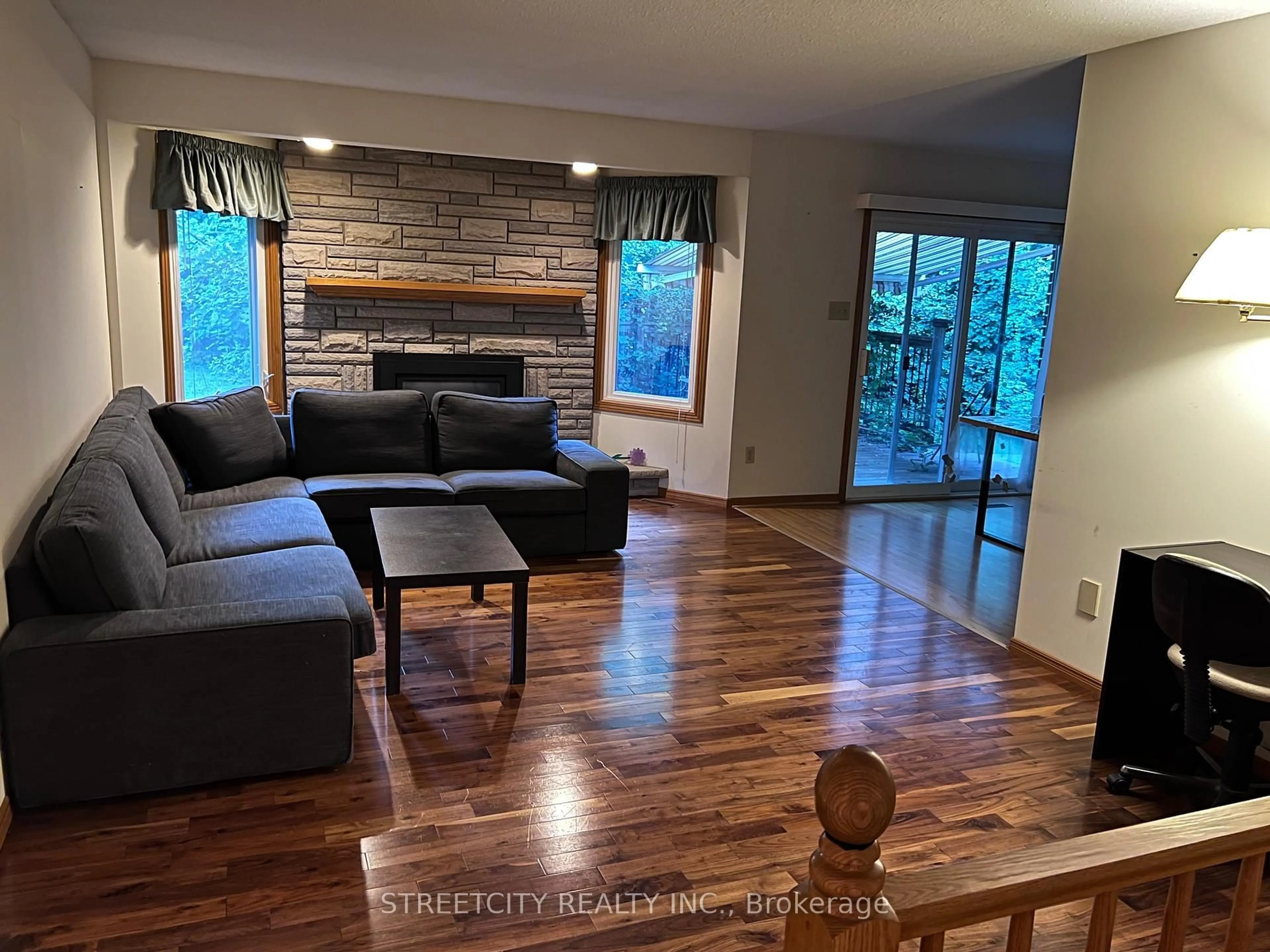 Living room with furniture, wood/laminate floor for 37 Jennifer Rd, London North Ontario N5X 3L5
