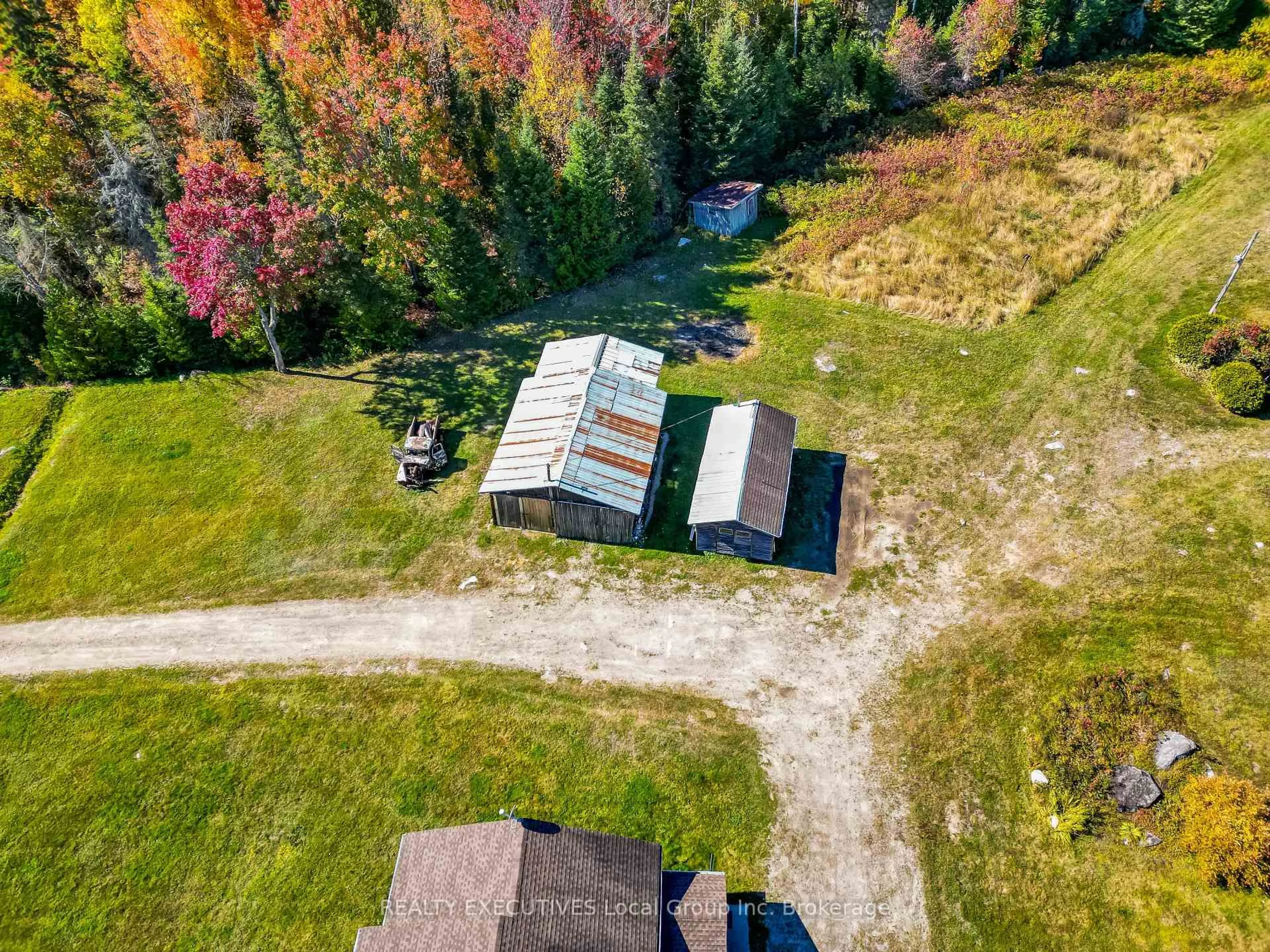 A pic from outside/outdoor area/front of a property/back of a property/a pic from drone, unknown for 400 Bomarc Rd, North Bay Ontario P1B 8G3