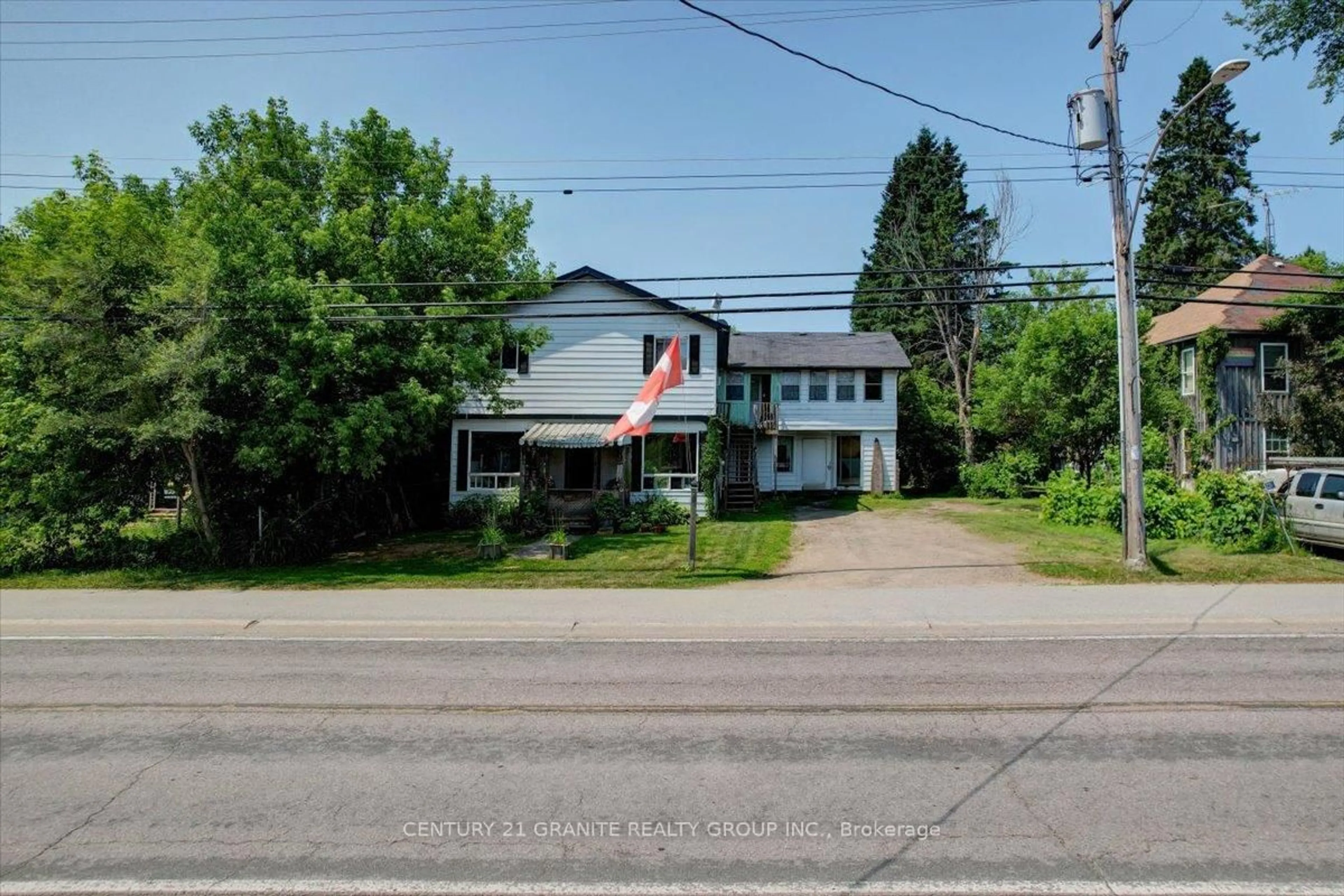 A pic from outside/outdoor area/front of a property/back of a property/a pic from drone, street for 2289 Loop Rd, Highlands East Ontario K0L 3C0