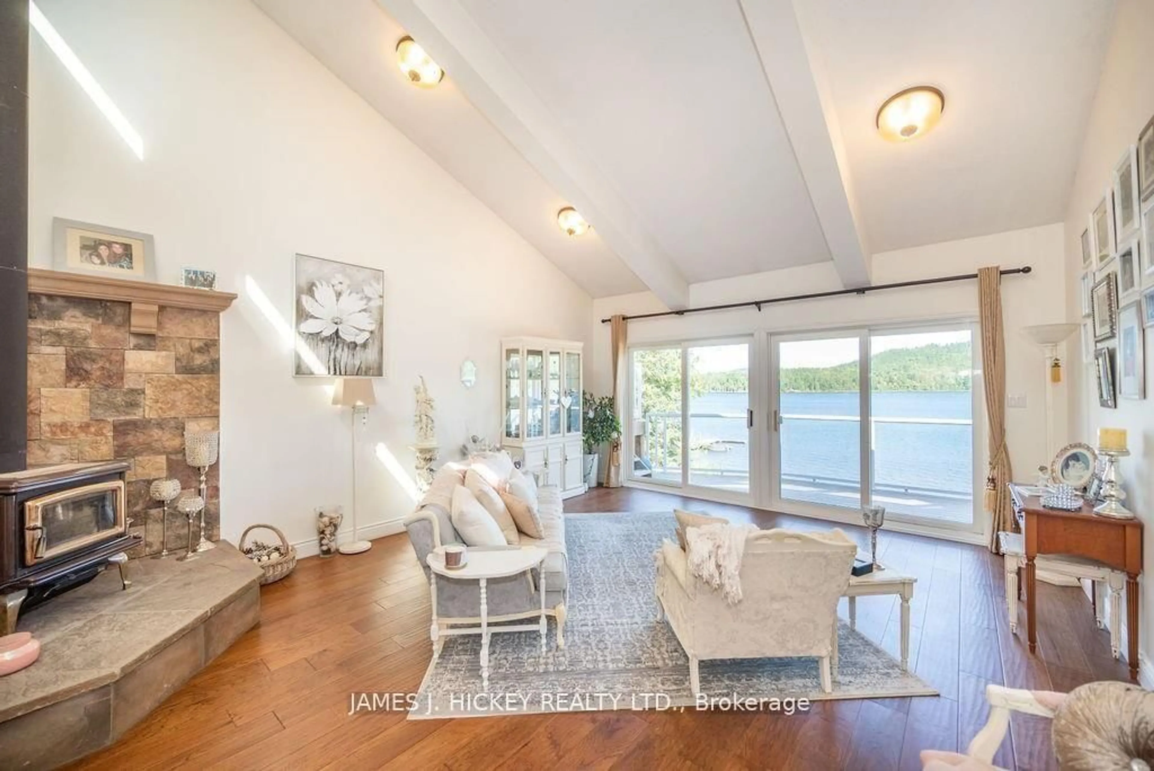 Living room with furniture, wood/laminate floor for 294 Lauren Rd, Deep River Ontario K0J 1P0