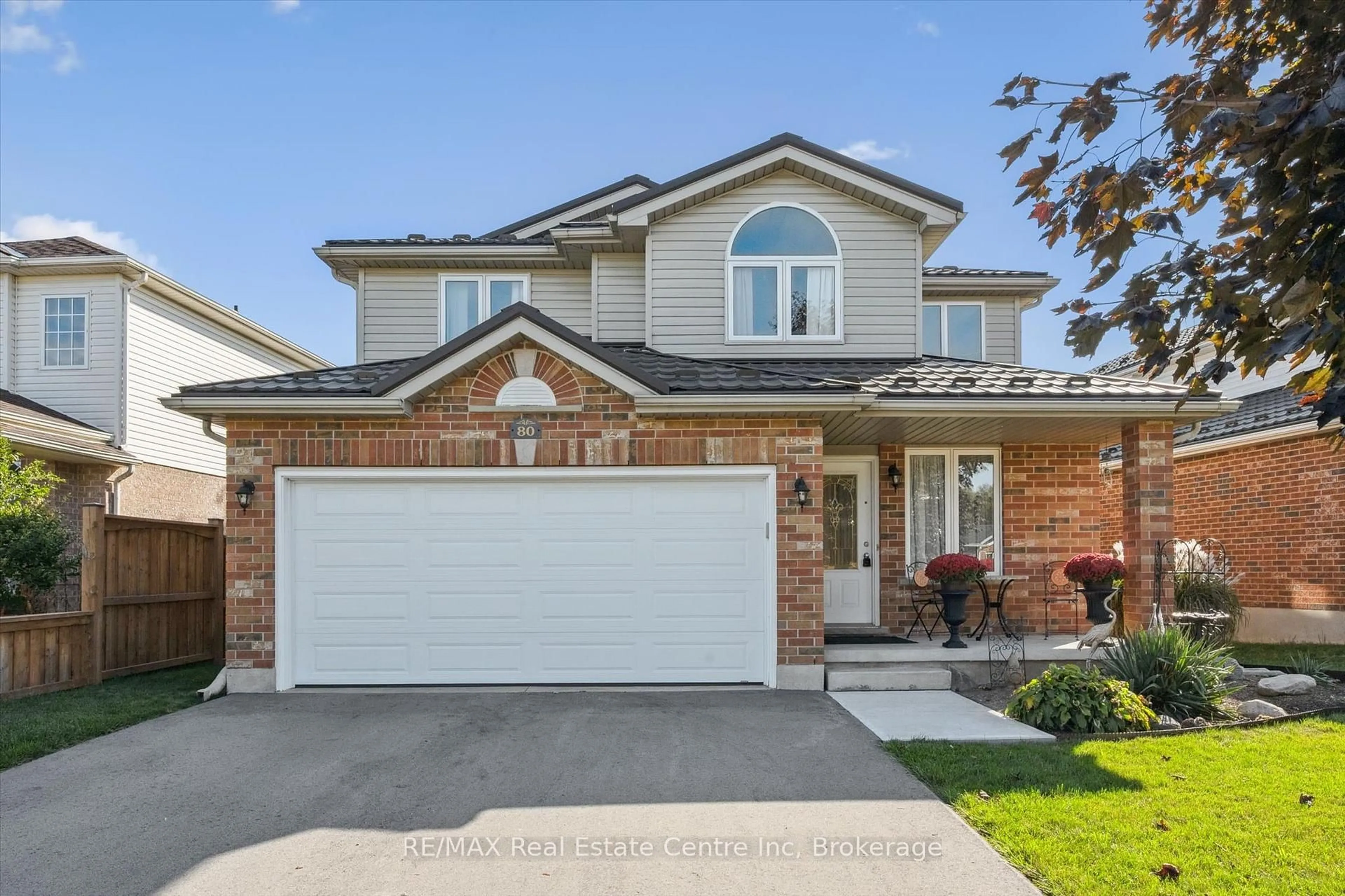 Home with brick exterior material, street for 80 Clairfields Dr, Guelph Ontario N1G 5H8
