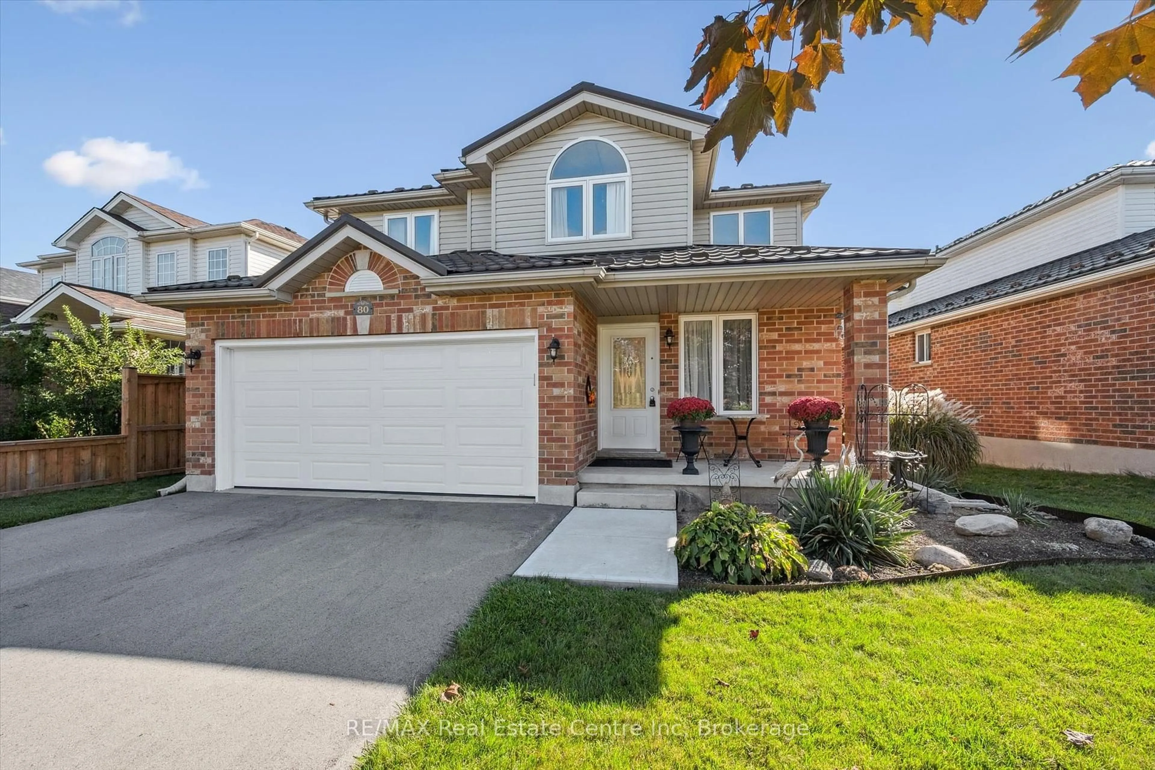 Home with brick exterior material, street for 80 Clairfields Dr, Guelph Ontario N1G 5H8