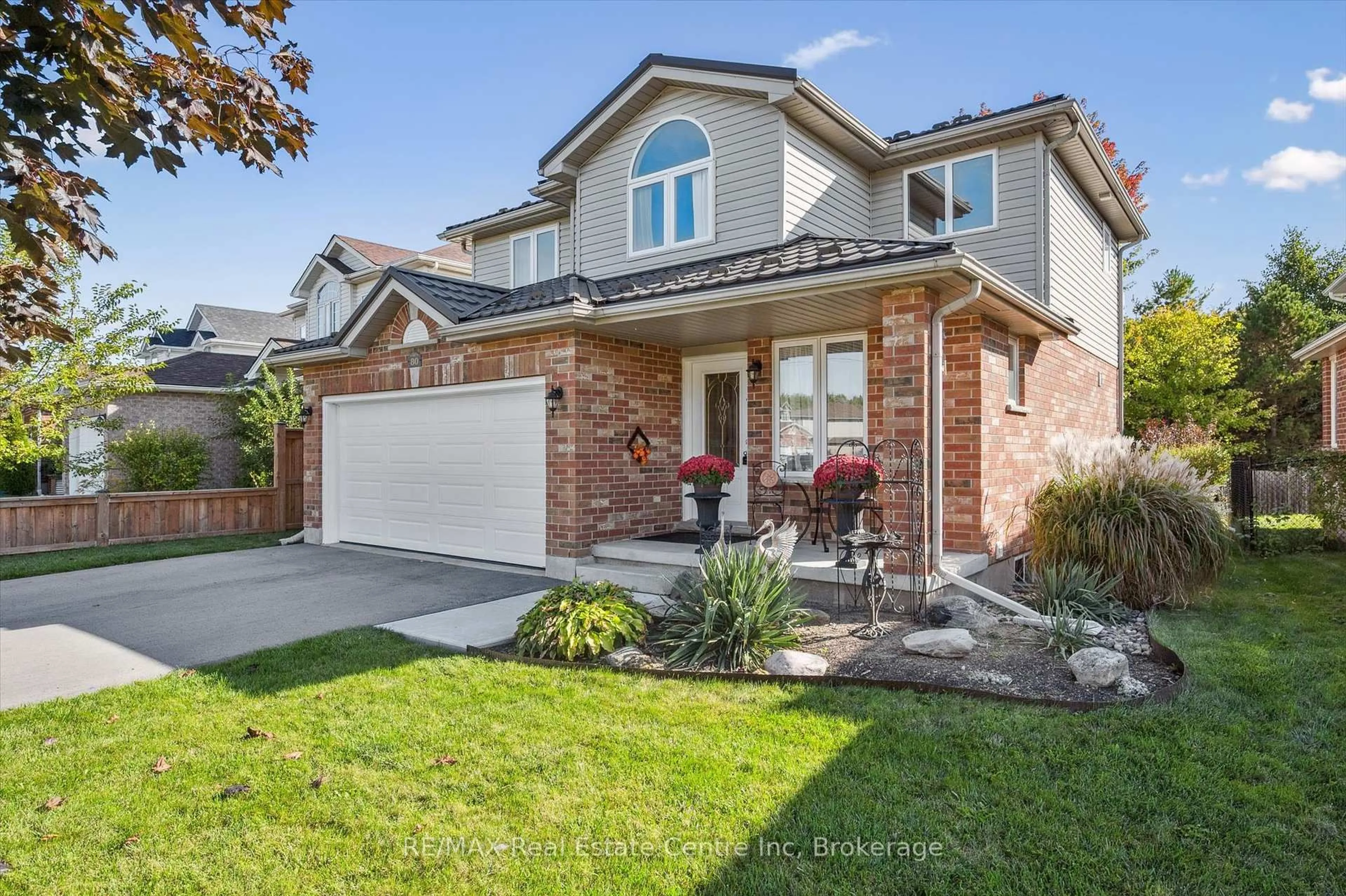 Home with brick exterior material, street for 80 Clairfields Dr, Guelph Ontario N1G 5H8