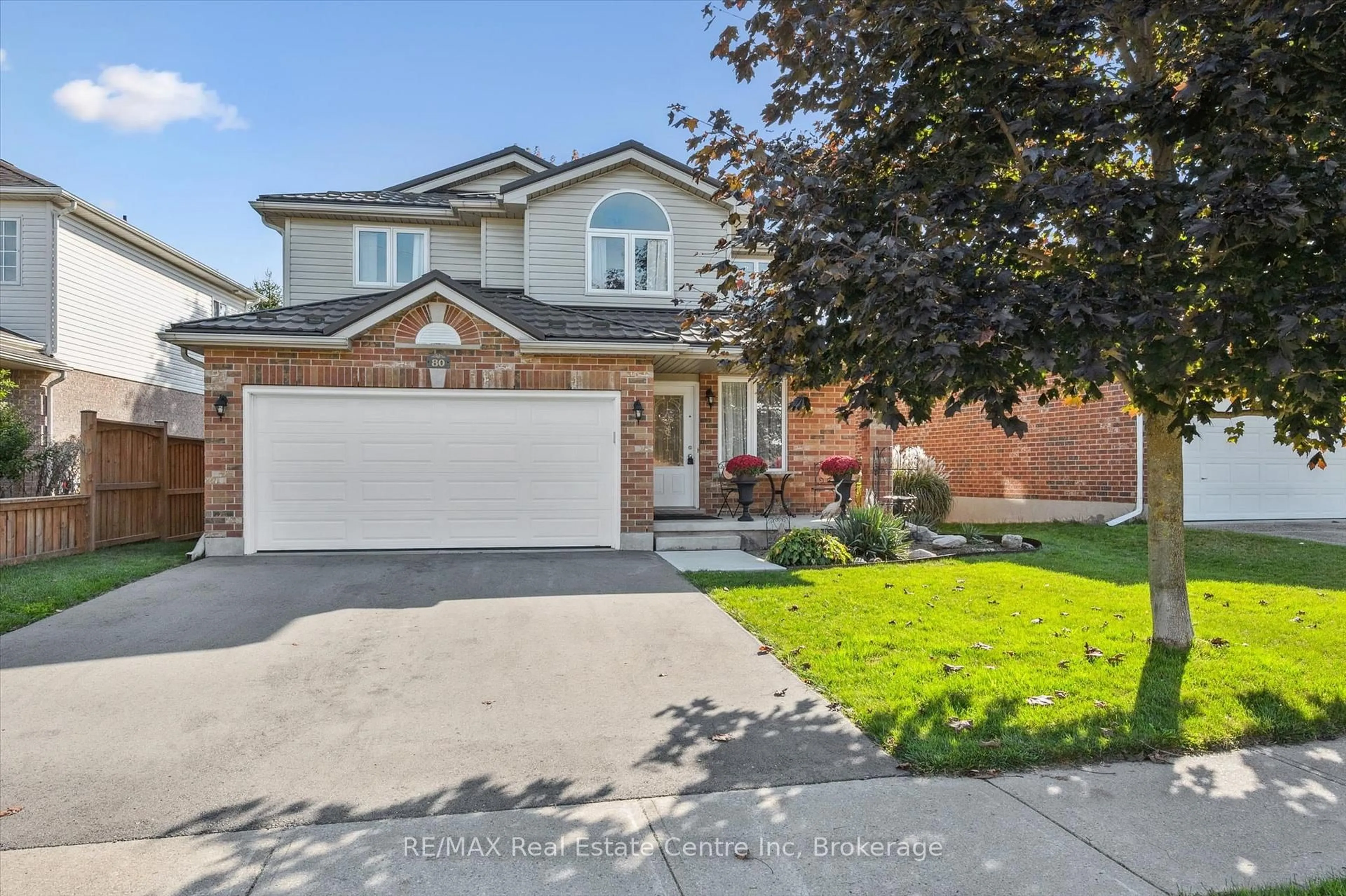 Home with brick exterior material, street for 80 Clairfields Dr, Guelph Ontario N1G 5H8