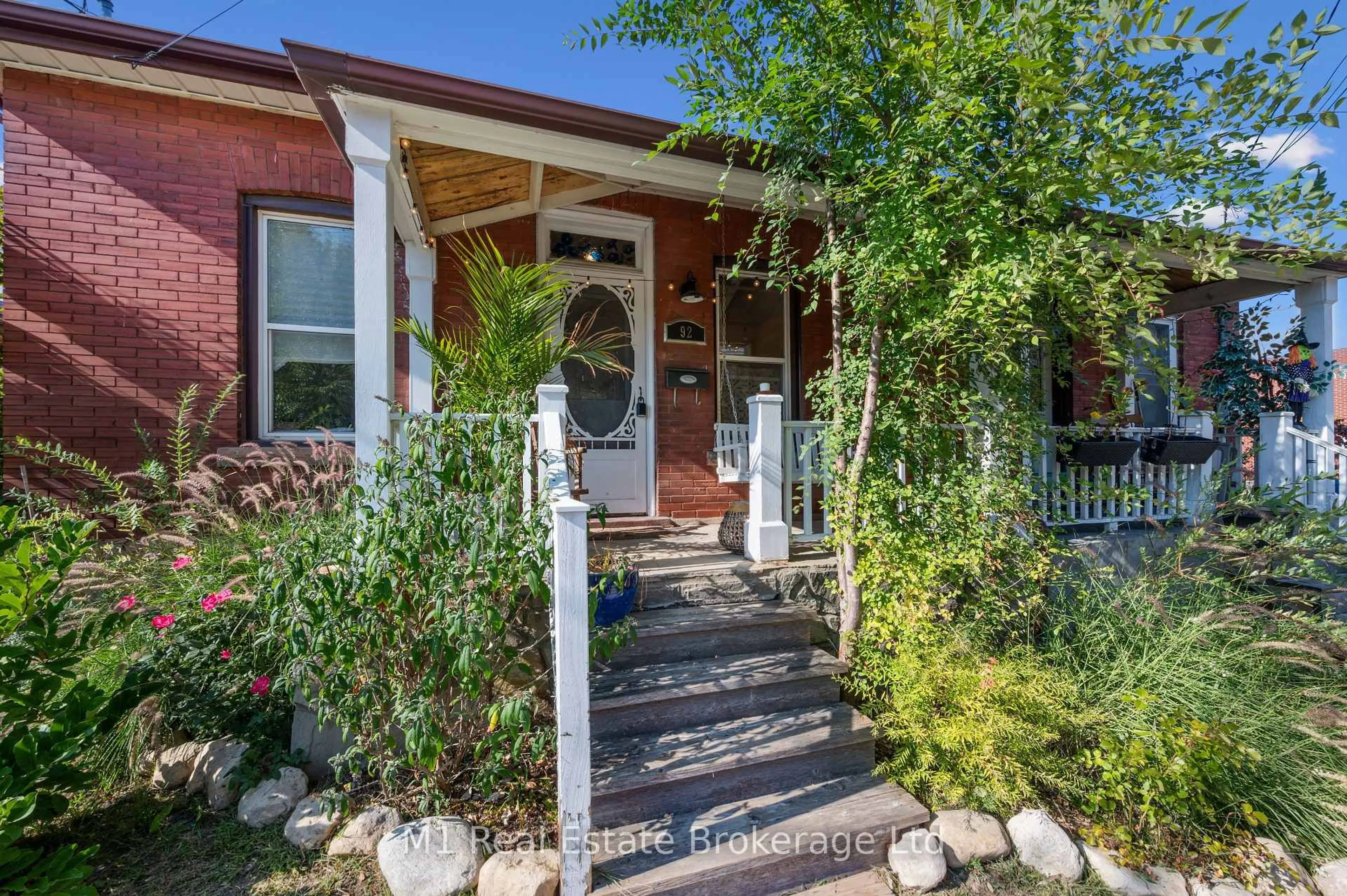 Home with brick exterior material, street for 92 Alice St, Guelph Ontario N1E 2Z8