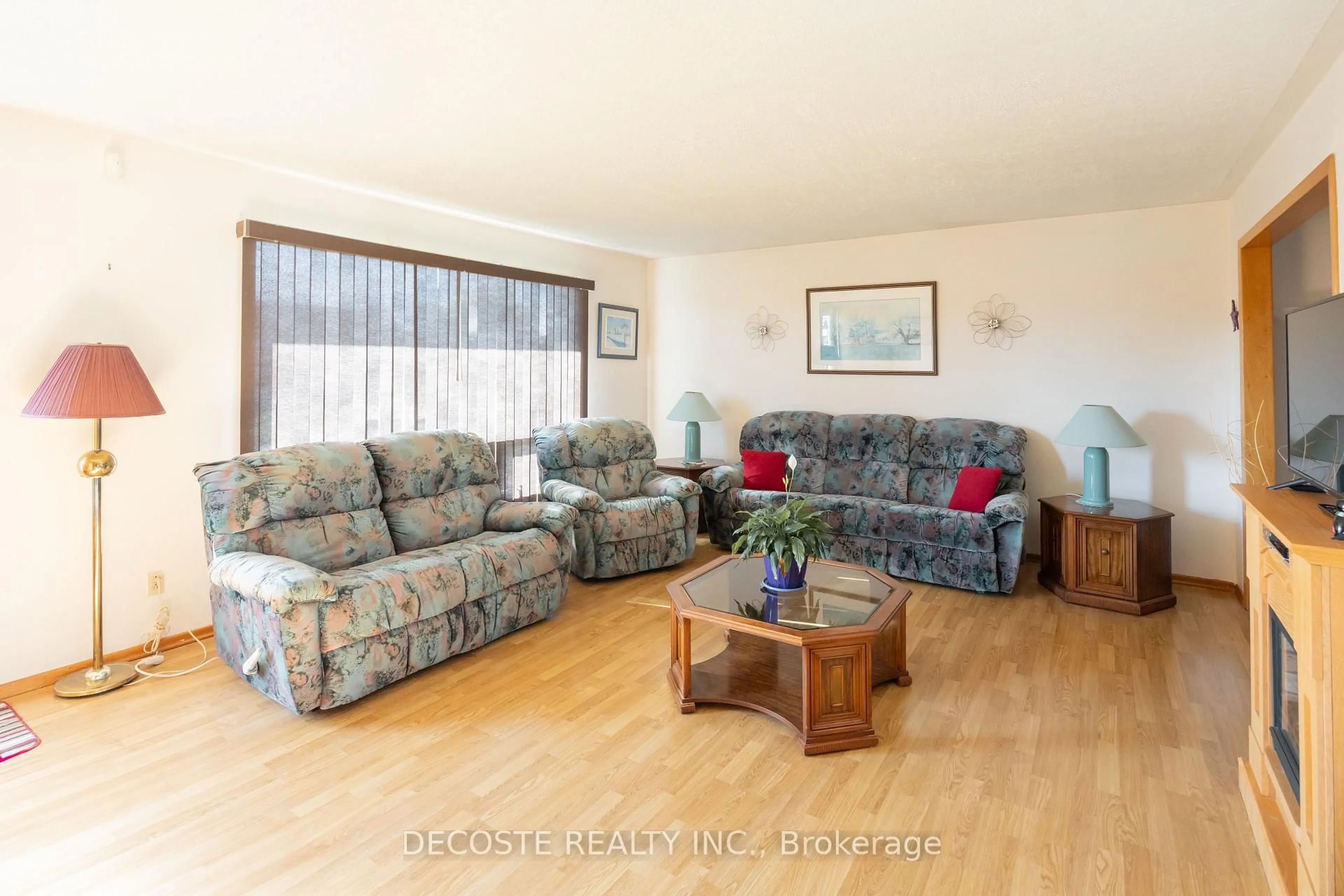 Living room with furniture, wood/laminate floor for 45 Clement St, North Glengarry Ontario K0C 1A0