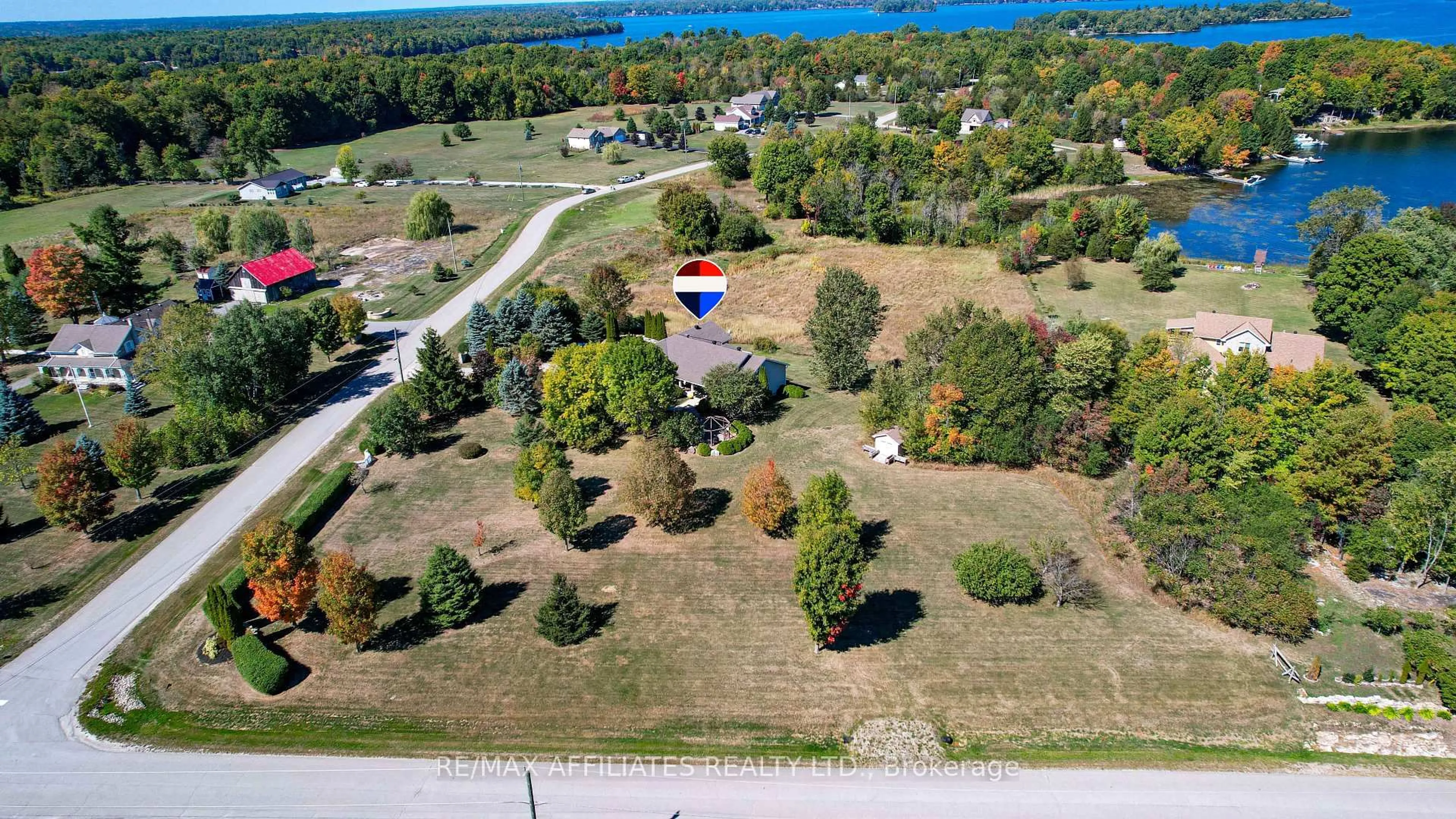 A pic from outside/outdoor area/front of a property/back of a property/a pic from drone, water/lake/river/ocean view for 8 Horace Dr, Rideau Lakes Ontario K0V 1X0
