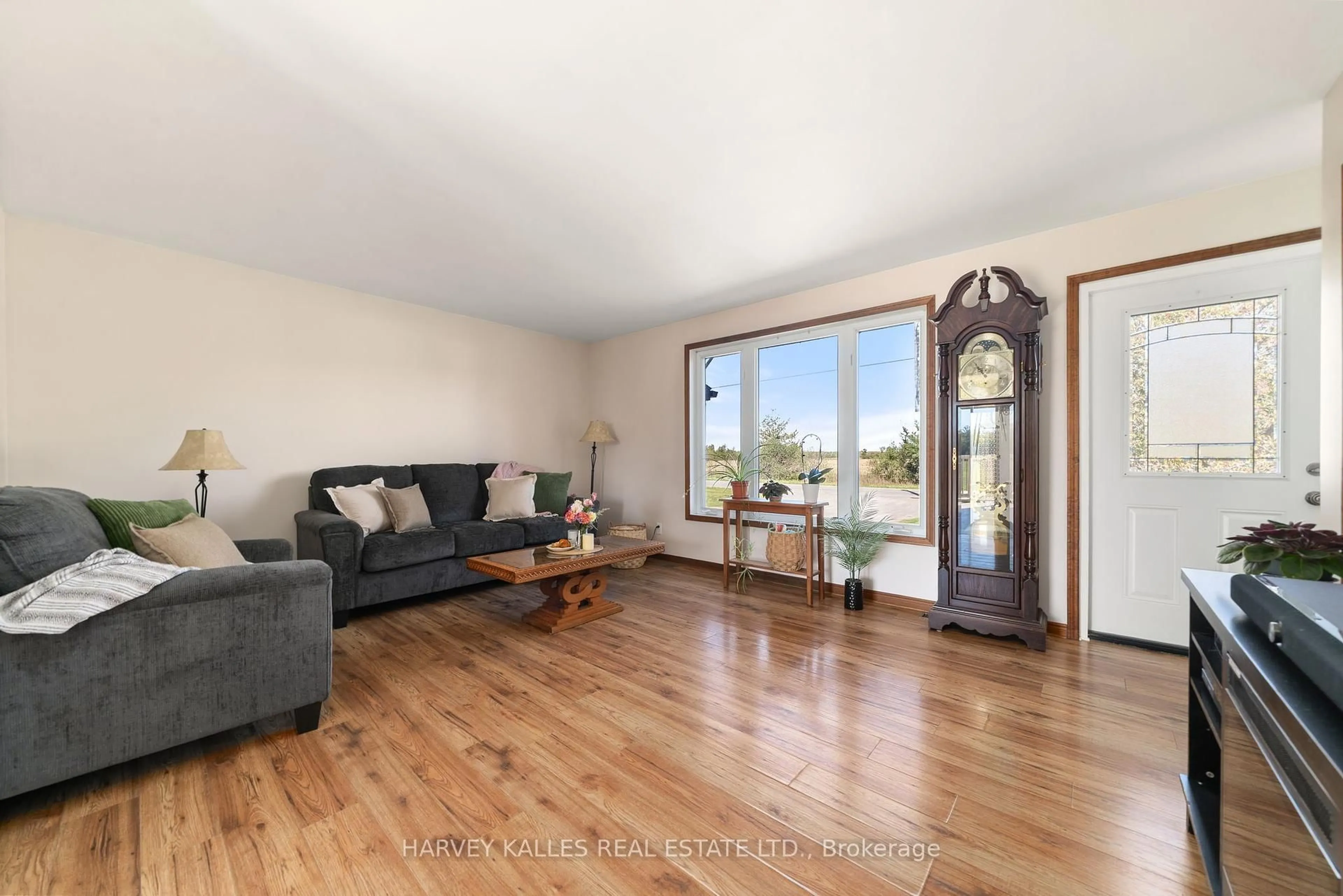 Living room with furniture, wood/laminate floor for 198 Welbanks Rd, Prince Edward County Ontario K0K 1P0