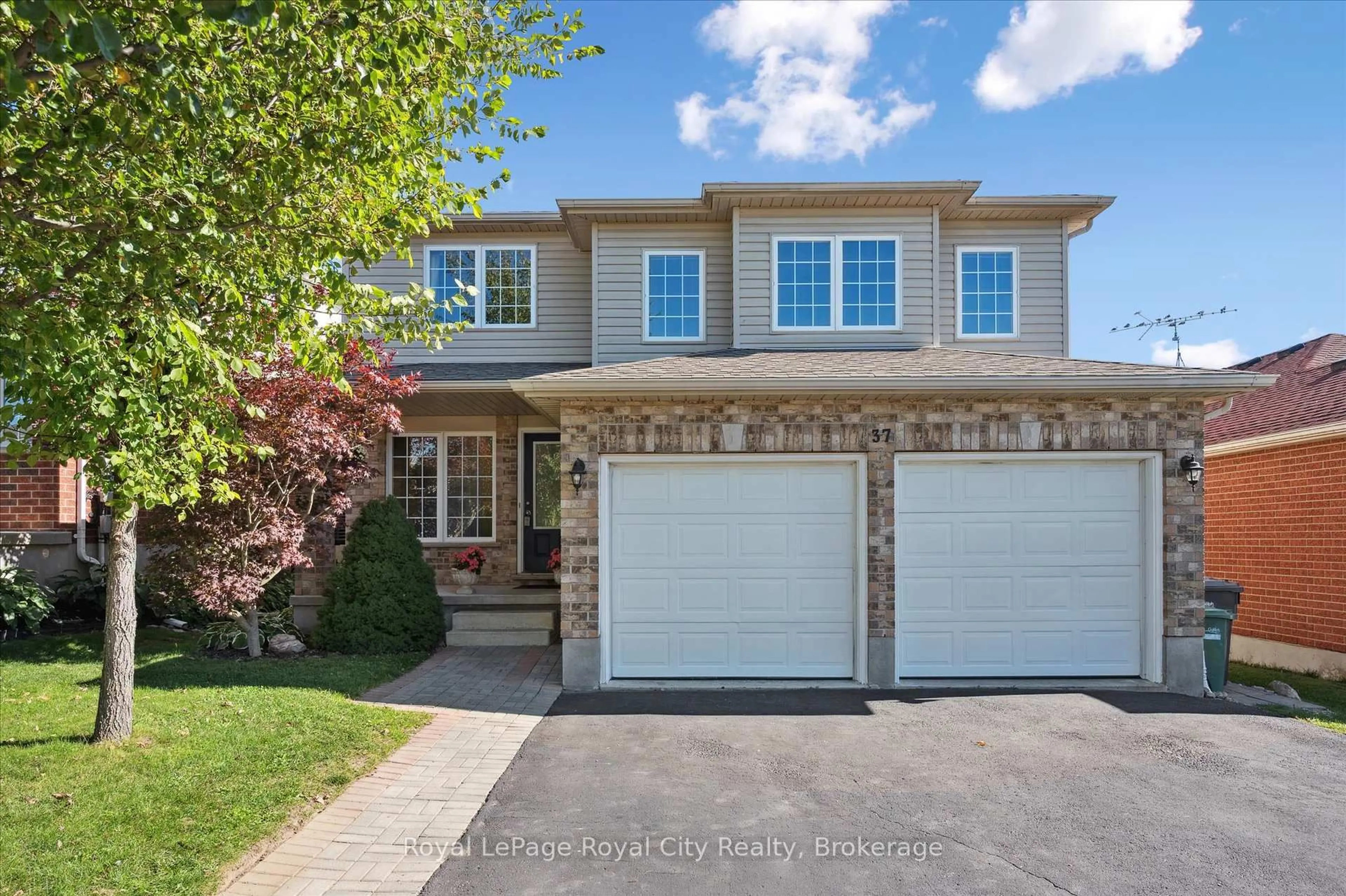 Home with brick exterior material, street for 37 Shackleton Dr, Guelph Ontario N1E 7L3