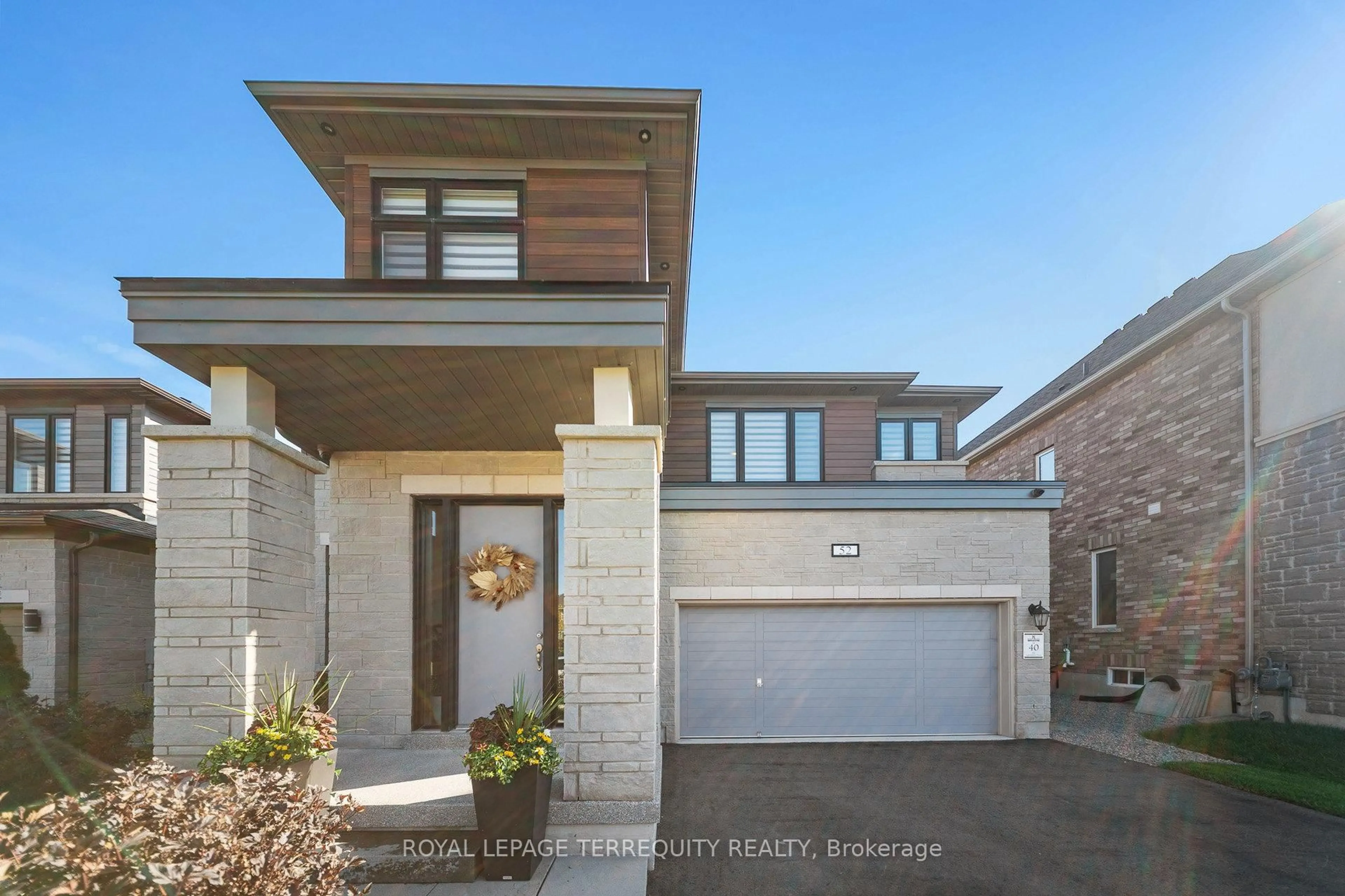 Home with brick exterior material, street for 52 Lightfeather Pl, Hamilton Ontario L9K 0H4