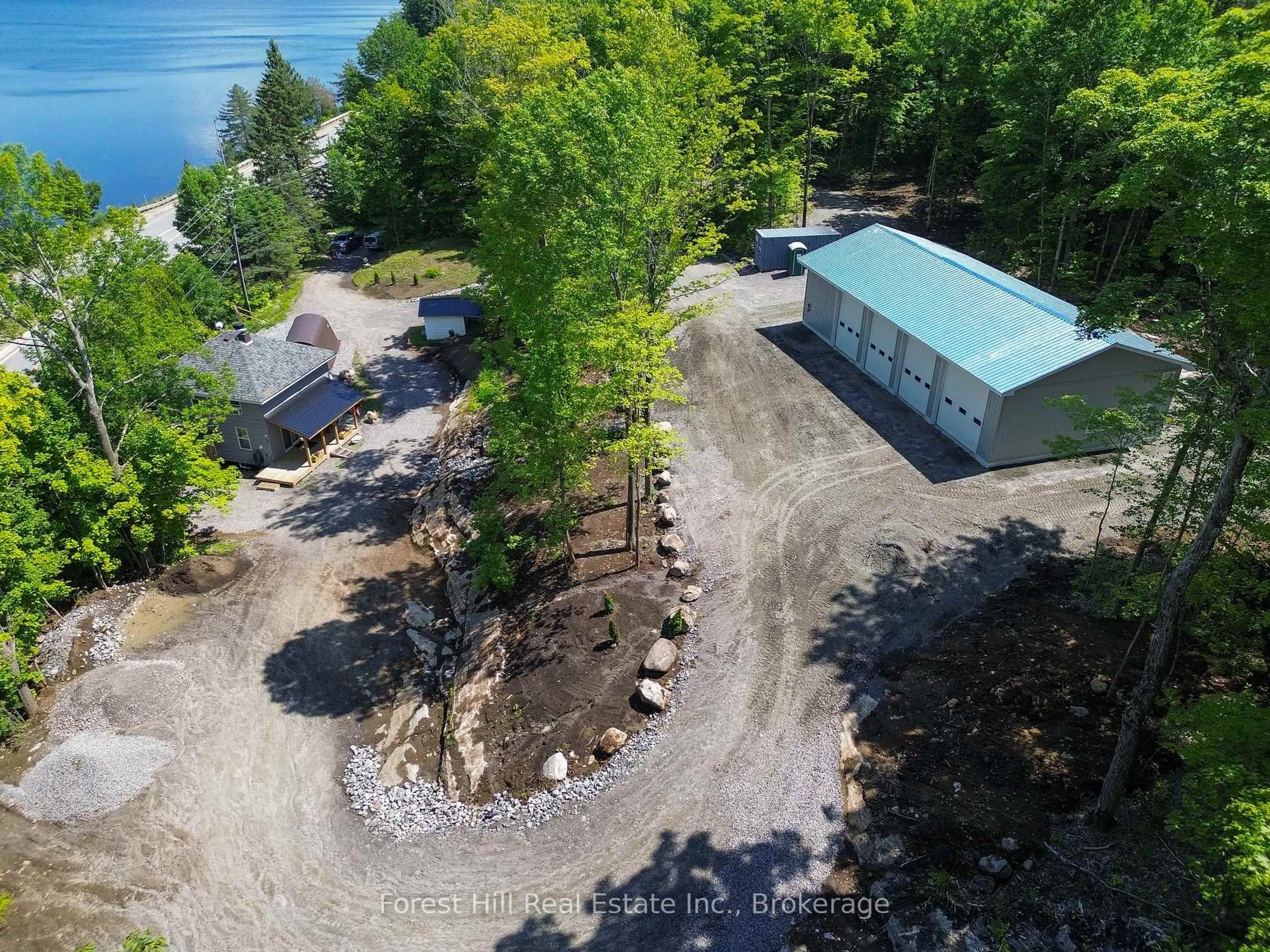 A pic from outside/outdoor area/front of a property/back of a property/a pic from drone, water/lake/river/ocean view for 4061 Muskoka Rd 169 Highway, Muskoka Lakes Ontario P0B 1J0