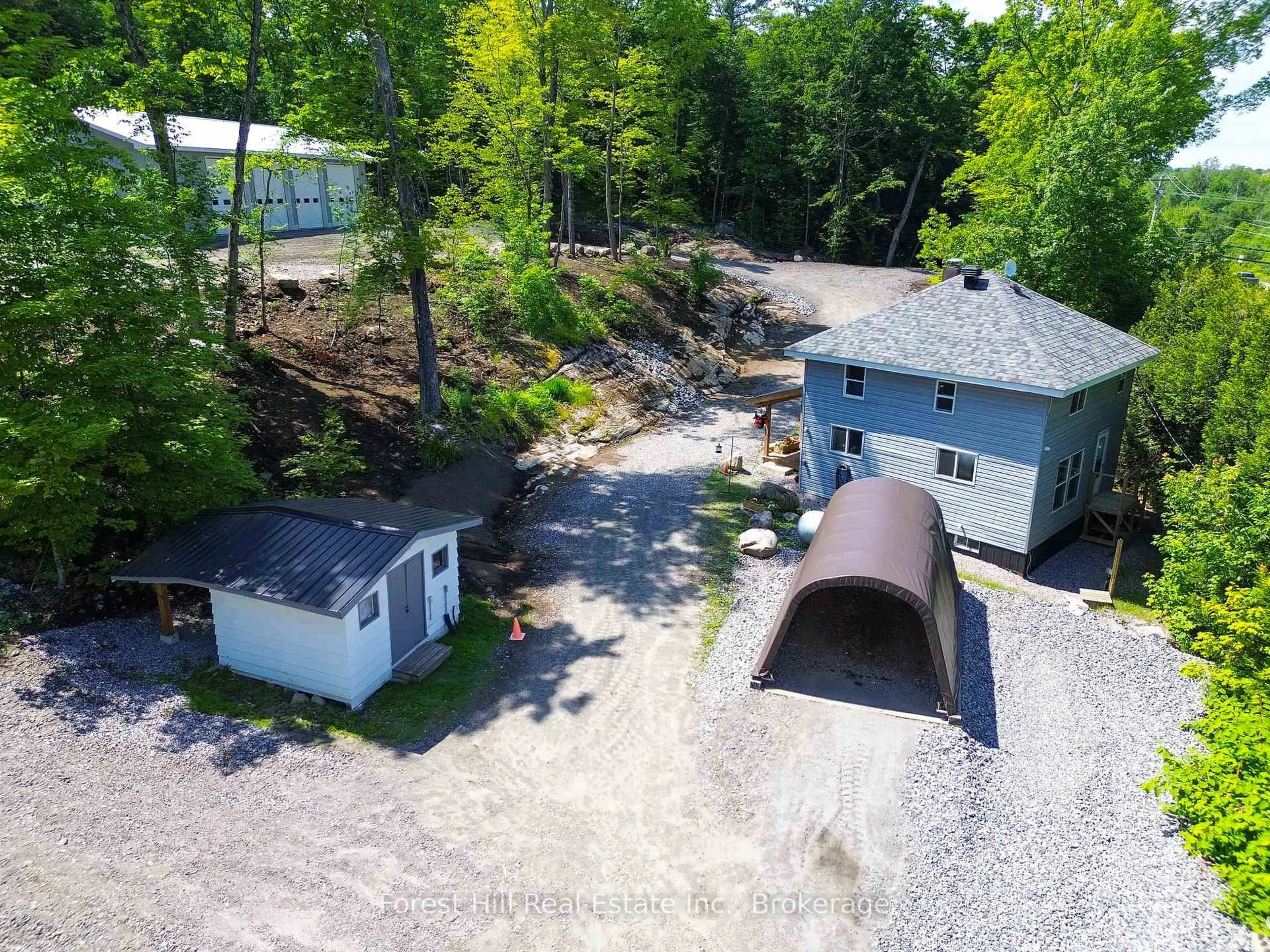 A pic from outside/outdoor area/front of a property/back of a property/a pic from drone, unknown for 4061 Muskoka Rd 169 Highway, Muskoka Lakes Ontario P0B 1J0