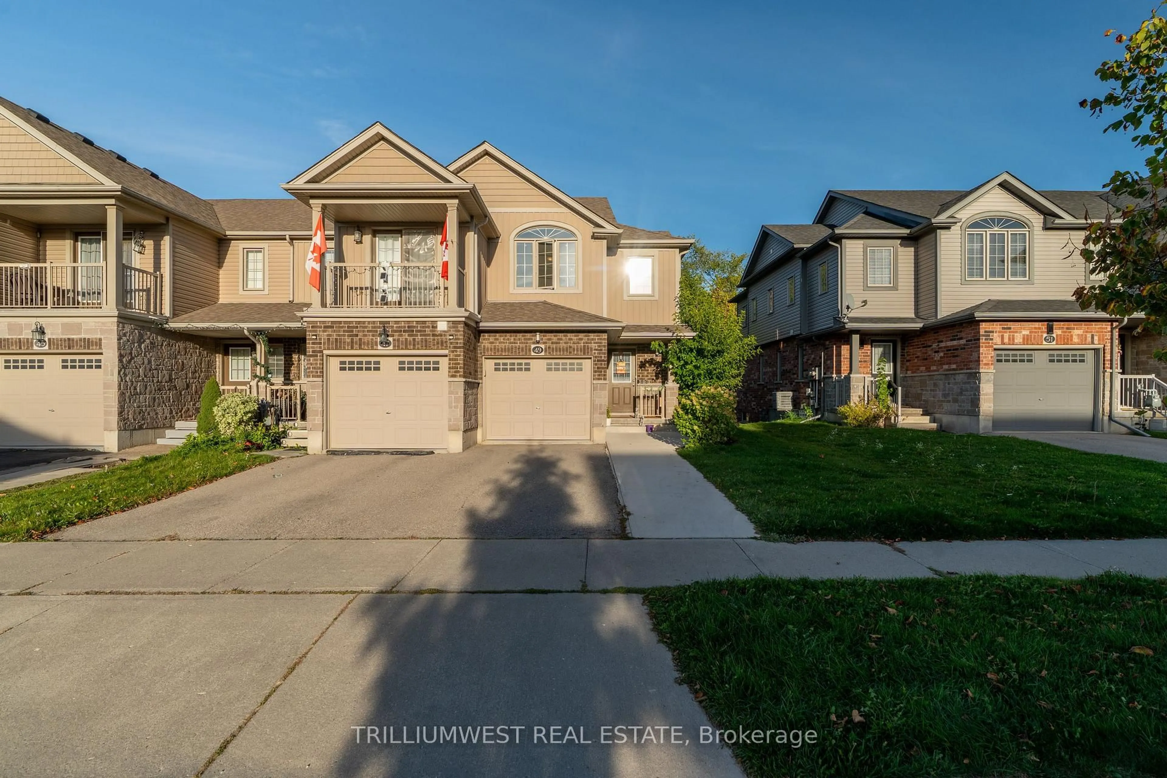 A pic from outside/outdoor area/front of a property/back of a property/a pic from drone, street for 49 Meadowridge St, Kitchener Ontario N2P 0E2