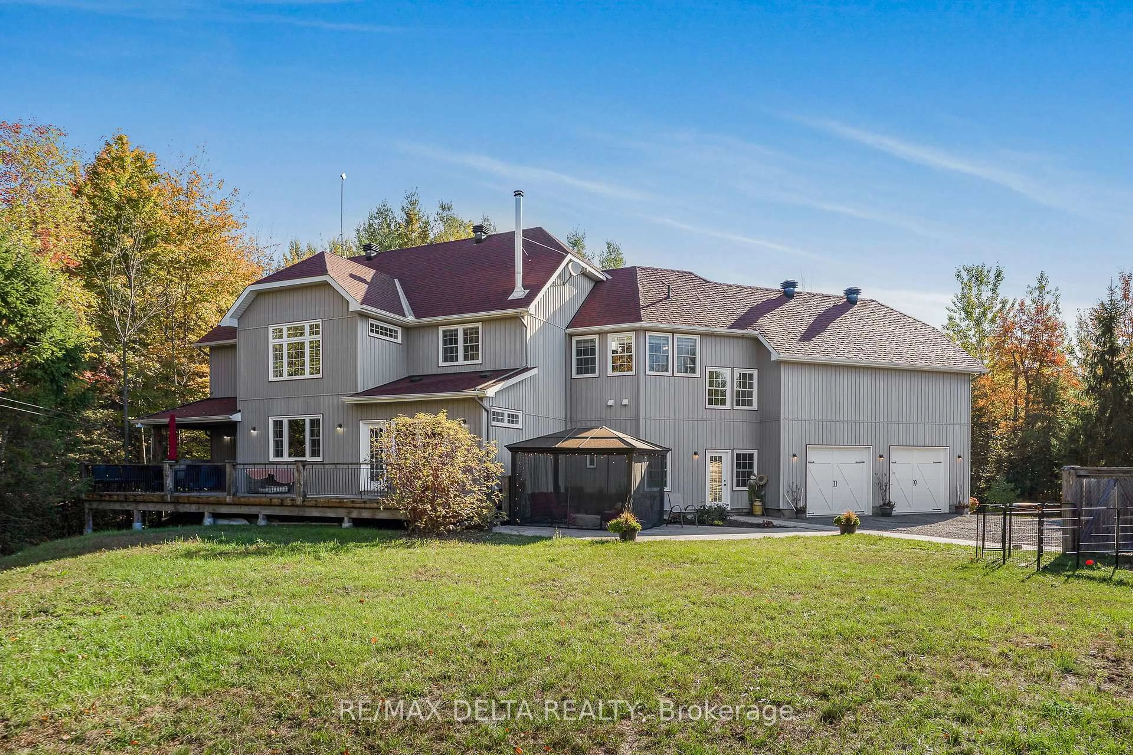 A pic from outside/outdoor area/front of a property/back of a property/a pic from drone, street for 1749 Albert Leroux Rd, The Nation Ontario K0A 1M0