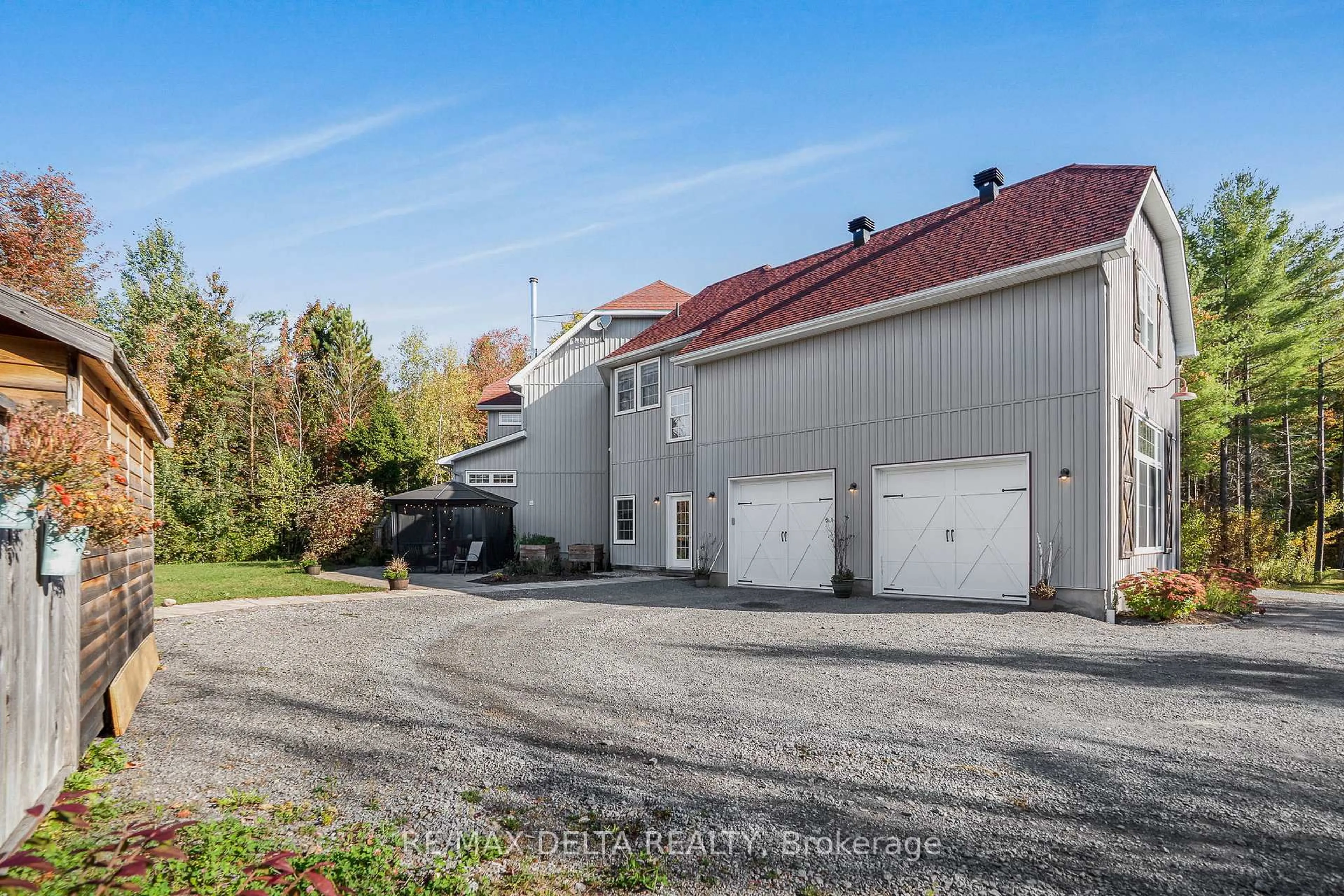 A pic from outside/outdoor area/front of a property/back of a property/a pic from drone, street for 1749 Albert Leroux Rd, The Nation Ontario K0A 1M0